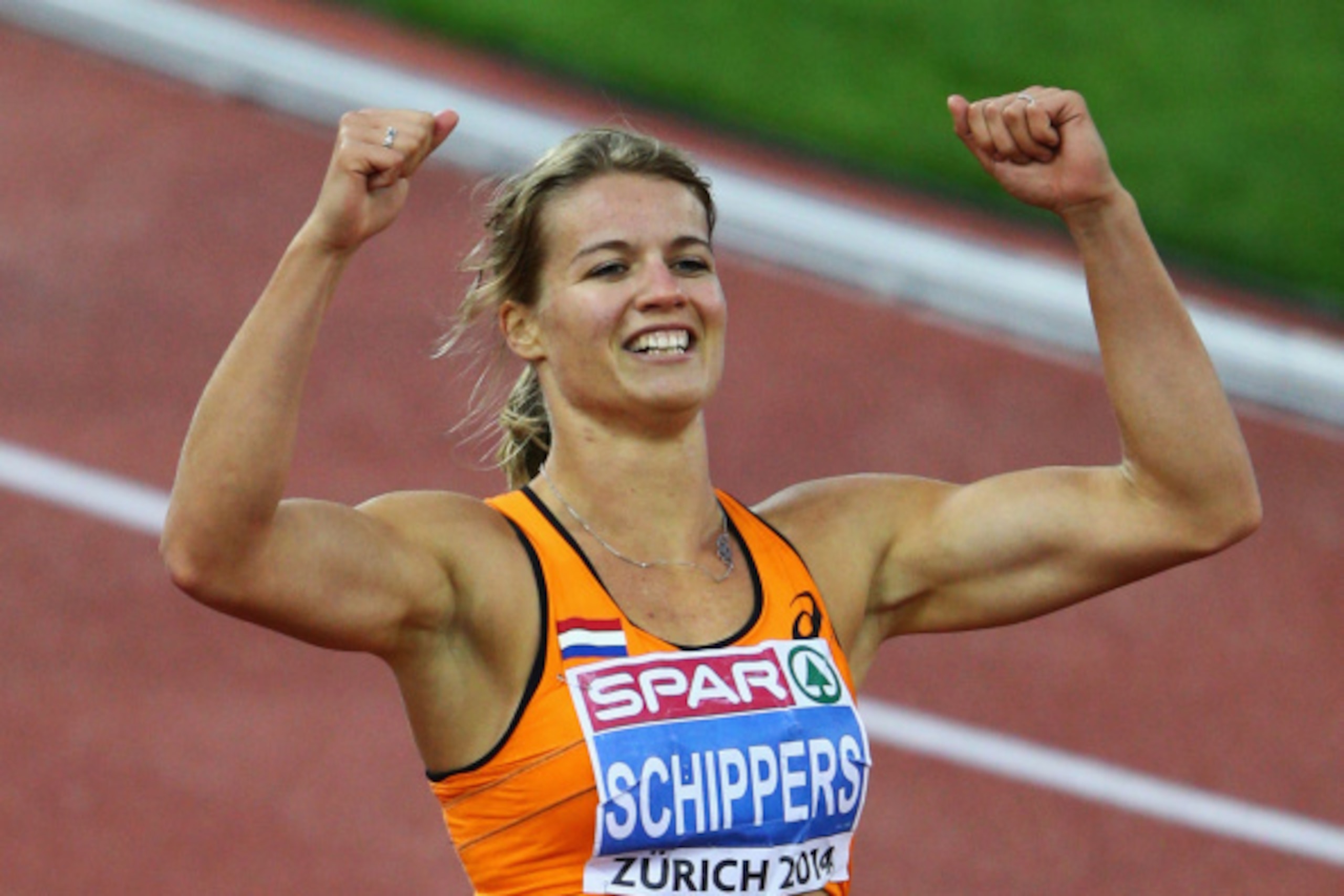 ZURICH, SWITZERLAND - AUGUST 15:  Dafne Schippers of the Netherlands celebrates after winning gold in the Women's 200 metres final during day four of the 22nd European Athletics Championships at Stadium Letzigrund on August 15, 2014 in Zurich, Switzerland