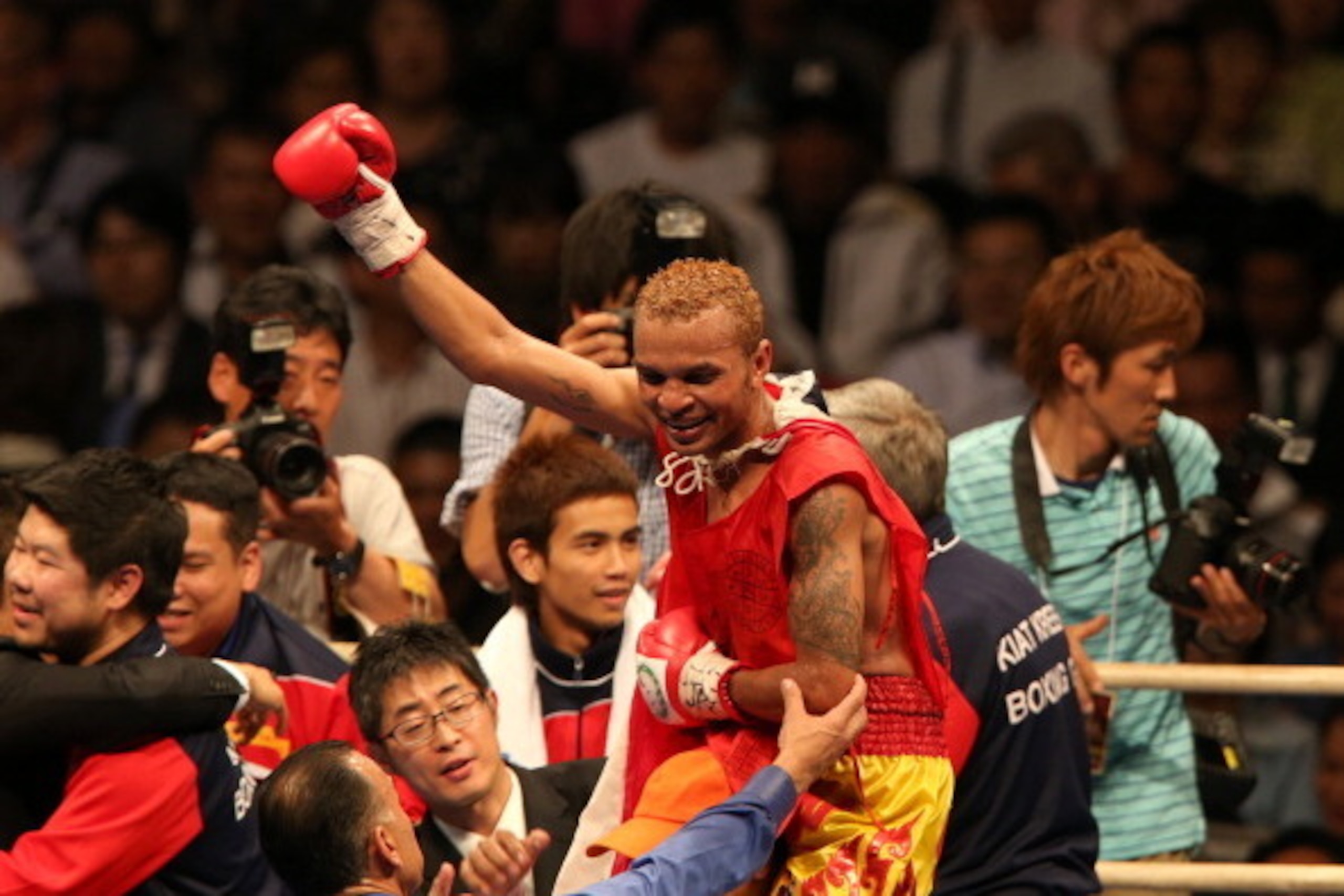 OSAKA, JAPAN - MAY 07:  Amnat Ruenroeng of Thailand celebrates after victory over Kazuto Ioka of japan during the IBF minimumweight title bout between Kazuto Ioka of Japan and Amnat Ruenroeng of Thailand at the Bodymaker Colosseum on May 7, 2014 in Osaka,