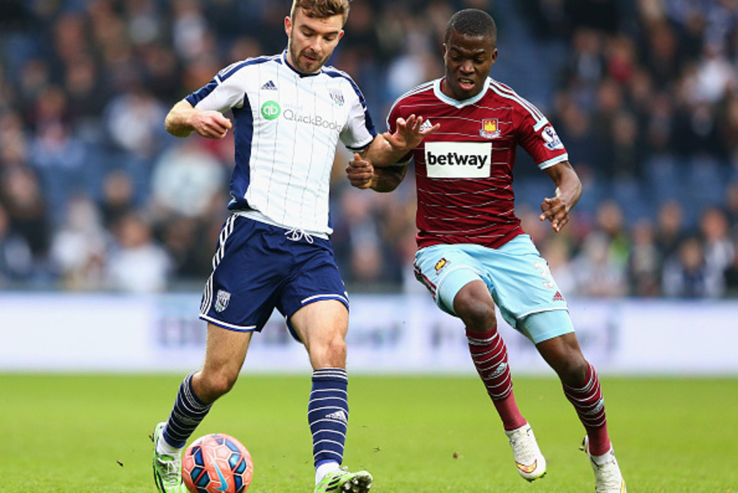 WEST BROMWICH, ENGLAND - FEBRUARY 14:  James Morrison of West Bromwich Albion holds off Enner Valencia of West Ham United during the FA Cup Fifth Round match between West Bromwich Albion and West Ham United at The Hawthorns on February 14, 2015 in West Br