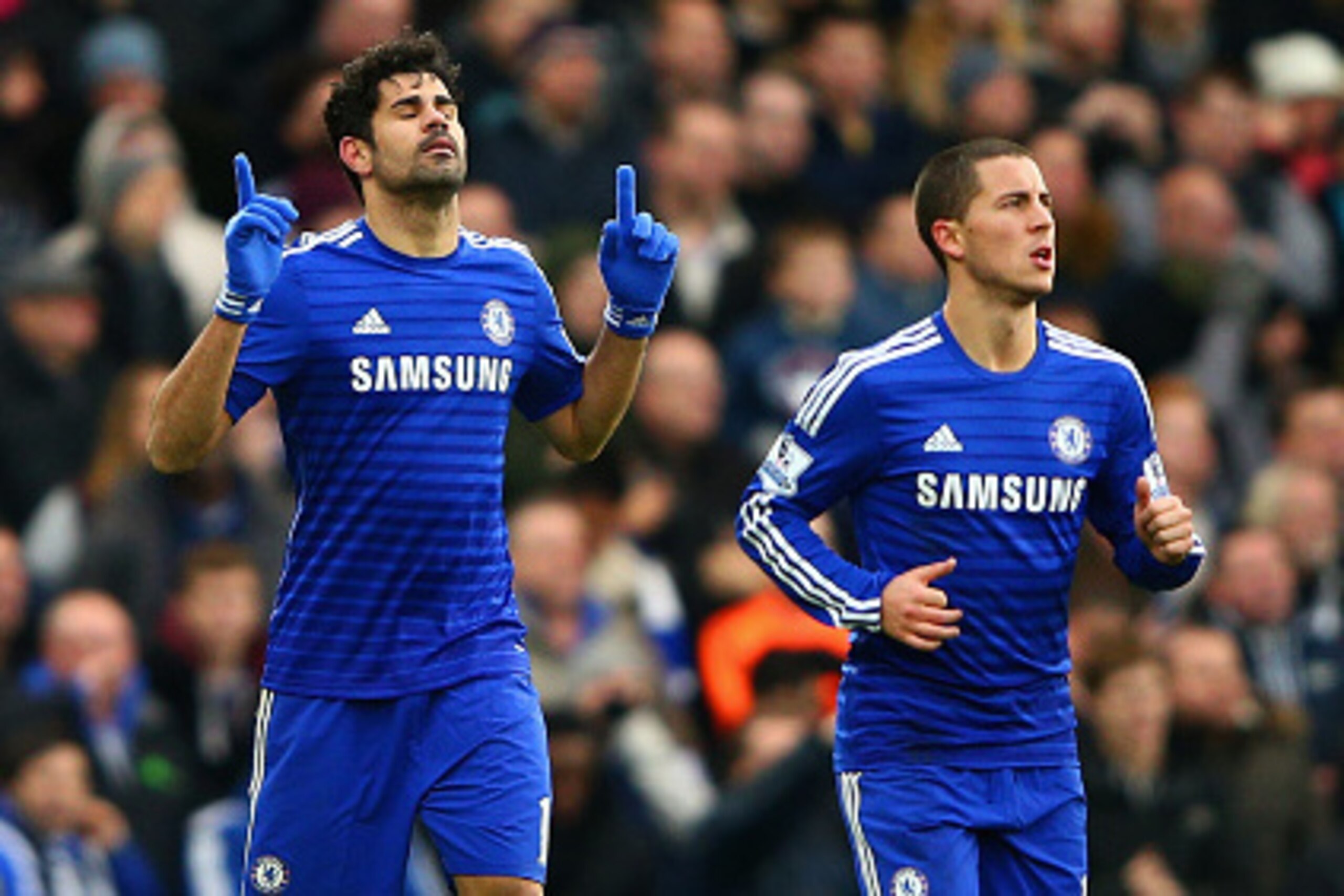 LONDON, ENGLAND - DECEMBER 26:  Diego Costa of Chelsea celebrates scoring their second goal with Eden Hazard of Chelsea  during the Barclays Premier League match between Chelsea and West Ham United at Stamford Bridge on December 26, 2014 in London, Englan