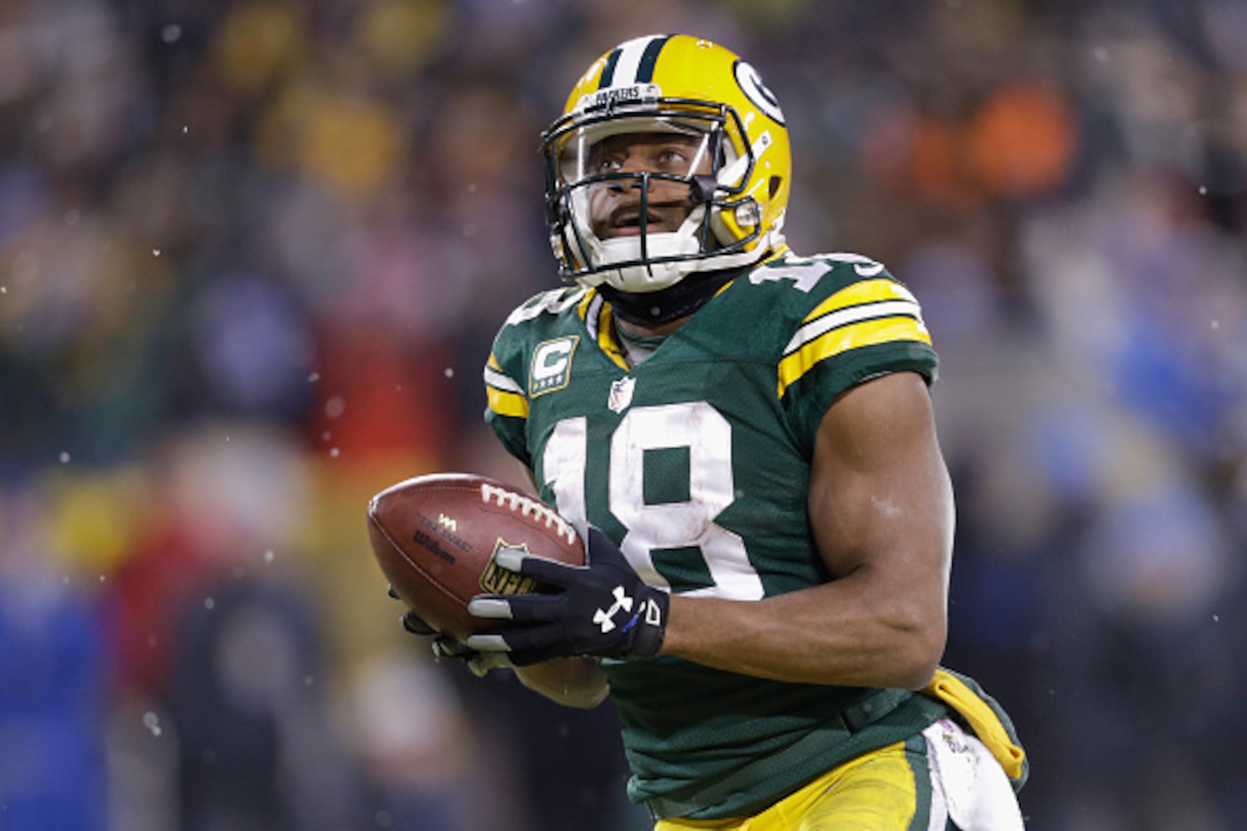 GREEN BAY, WI - DECEMBER 28:  Wide receiver Randall Cobb #18 of the Green Bay Packers reacts after scoring in the third quarter for his second touchdown against the Detroit Lions during the NFL game at Lambeau Field on December 28, 2014 in Green Bay, Wisc