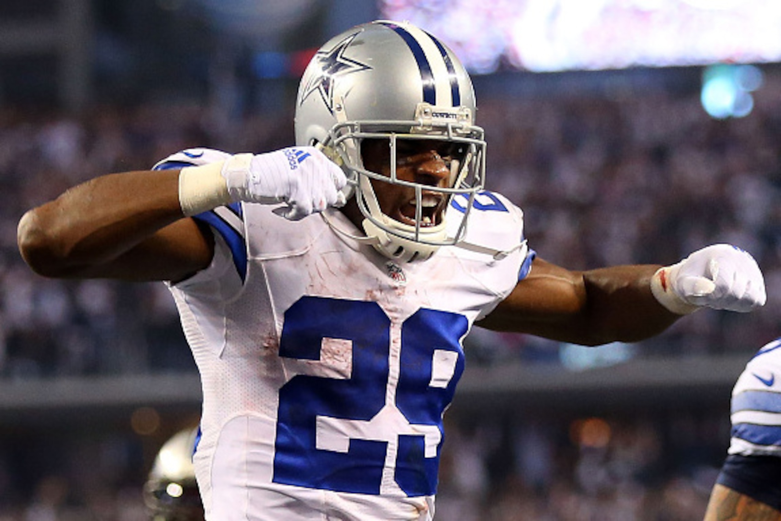 ARLINGTON, TX - JANUARY 04:  DeMarco Murray #29 of the Dallas Cowboys celebrates after running for a touchdown against the Detroit Lions during the second half of their NFC Wild Card Playoff game at AT&T Stadium on January 4, 2015 in Arlington, Texas.  (P