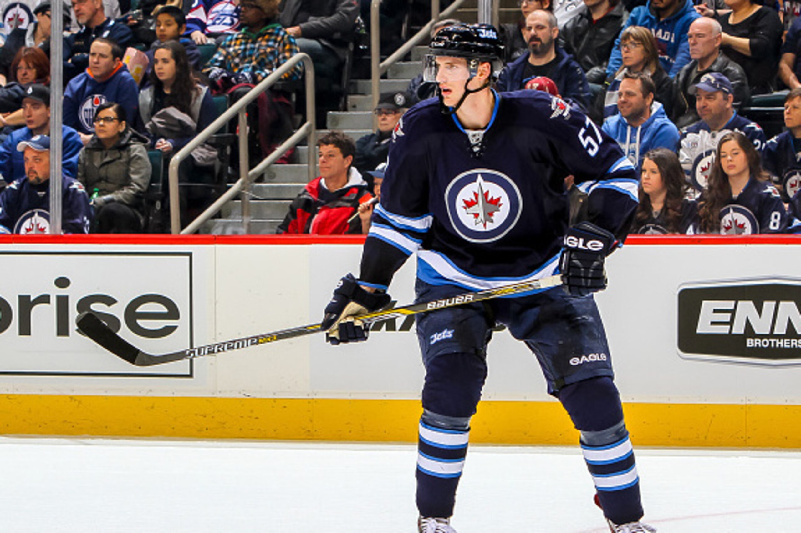 WINNIPEG, CANADA - FEBRUARY 16: Tyler Myers #57 of the Winnipeg Jets keeps an eye on the play during second period action against the Edmonton Oilers on February 16, 2015 at the MTS Centre in Winnipeg, Manitoba, Canada. The Jets defeated the Oilers 5-4 in WINNIPEG, CANADA - FEBRUARY 16: Tyler Myers #57 of the Winnipeg Jets keeps an eye on the play during second period action against the Edmonton Oilers on February 16, 2015 at the MTS Centre in Winnipeg, Manitoba, Canada. The Jets defeated the Oilers 5-4 in