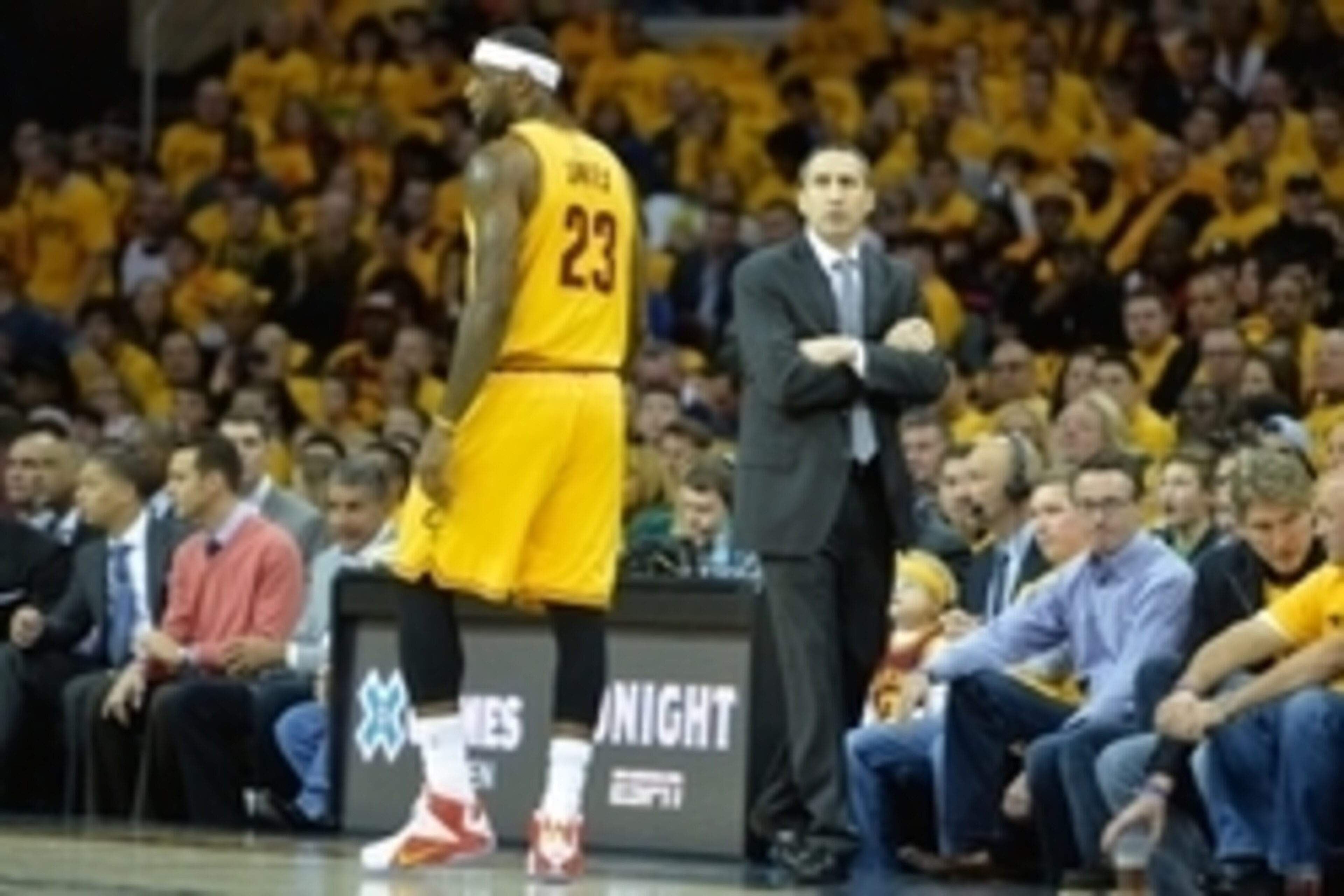 Jan 25, 2015; Cleveland, OH, USA; Cleveland Cavaliers head coach David Blatt (right) reacts beside forward LeBron James (23) against the Oklahoma City Thunder at Quicken Loans Arena. Cleveland won 108-98. Mandatory Credit: David Richard-USA TODAY Sports