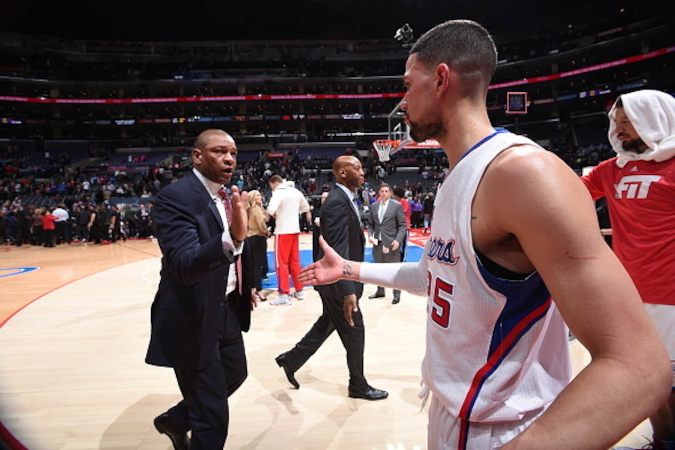 LOS ANGELES, CA - JANUARY 22: Doc Rivers and Austin Rivers #25 celebrates during a game against the Brooklyn Nets at STAPLES Center on January 22, 2015 in Los Angeles, California. NOTE TO USER: User expressly acknowledges and agrees that, by downloading a