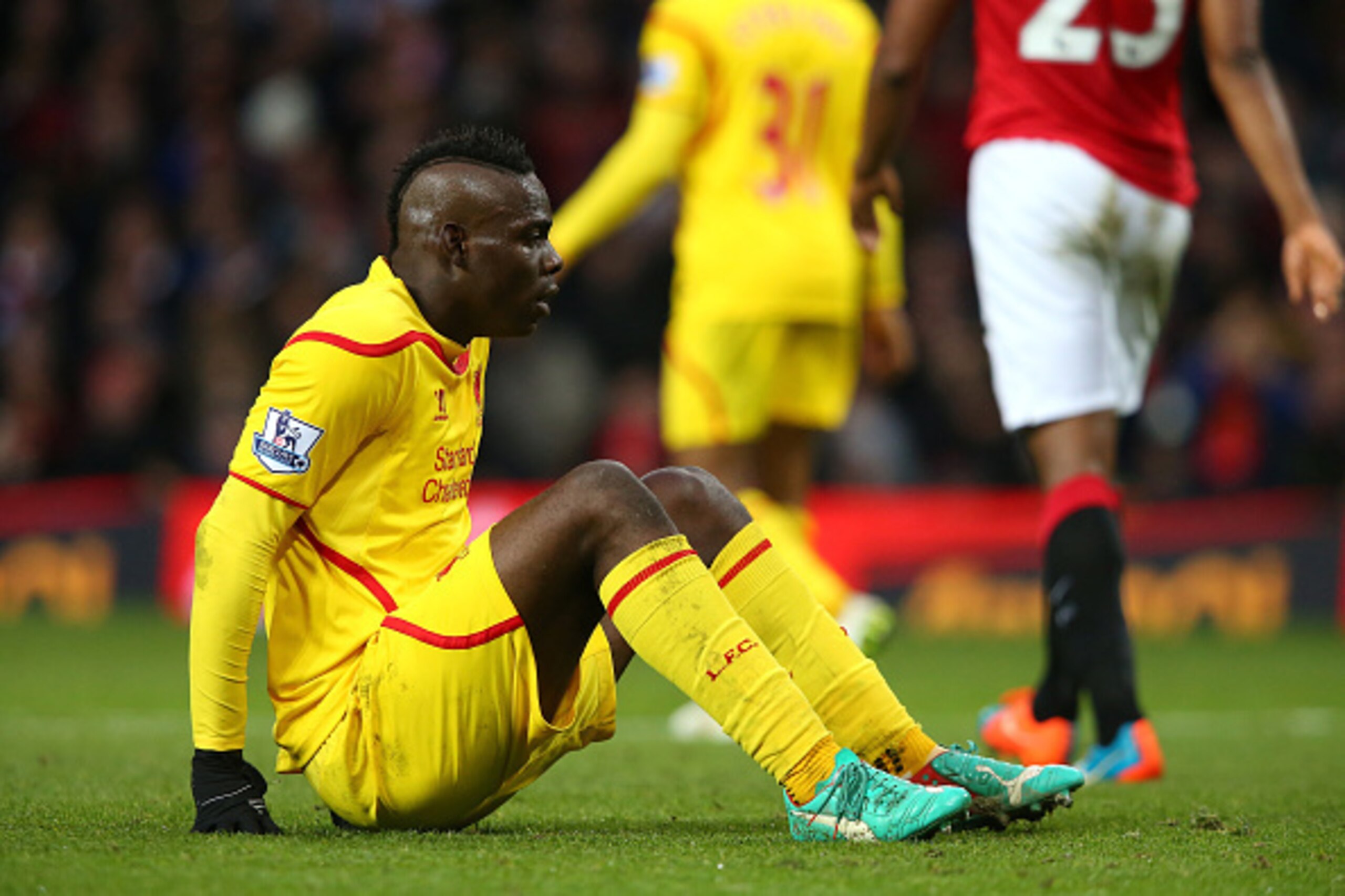 MANCHESTER, ENGLAND - DECEMBER 14:  Mario Balotelli of Liverpool reacts to a missed chance during the Barclays Premier League match between Manchester United and Liverpool at Old Trafford on December 14, 2014 in Manchester, England.  (Photo by Alex Livese