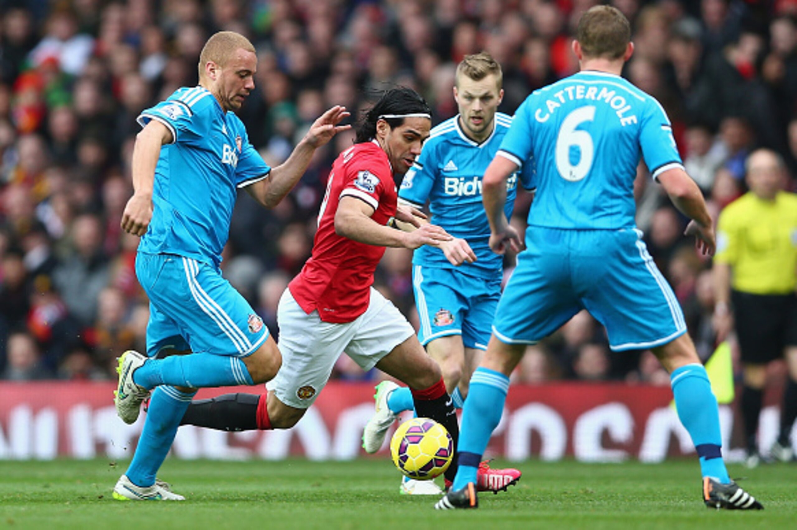 MANCHESTER, ENGLAND - FEBRUARY 28: Radamel Falcao of Manchester United moves away from Wes Brown of Sunderland during the Barclays Premier League match between Manchester United and Sunderland at Old Trafford on February 28, 2015 in Manchester, England.  