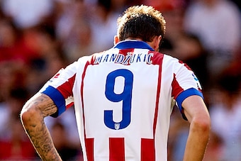VALENCIA, SPAIN - OCTOBER 04:  Mario Mandzukic of Atletico de Madrid reacts as he fails to score during the La Liga match between Valencia CF and Club Atletico de Madrid at Estadi de Mestalla on October 4, 2014 in Valencia, Spain.  (Photo by Manuel Queima