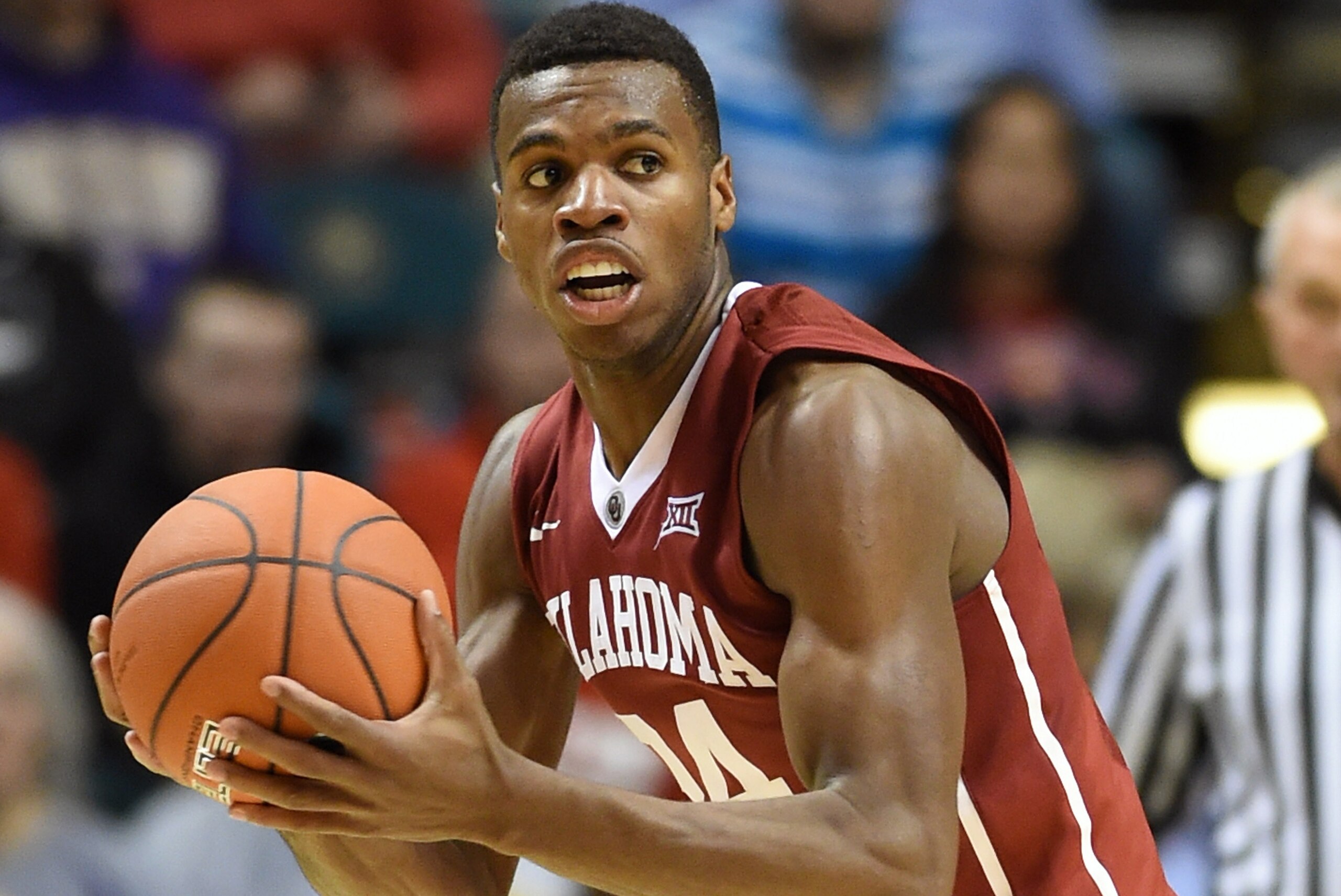 LAS VEGAS, NV - DECEMBER 20: Buddy Hield #24 of the Oklahoma Sooners grabs a rebound against the Washington Huskies during the 2014 MGM Grand Showcase basketball event at the MGM Grand Garden Arena on December 20, 2014 in Las Vegas, Nevada. Washington wo LAS VEGAS, NV - DECEMBER 20: Buddy Hield #24 of the Oklahoma Sooners grabs a rebound against the Washington Huskies during the 2014 MGM Grand Showcase basketball event at the MGM Grand Garden Arena on December 20, 2014 in Las Vegas, Nevada. Washington wo