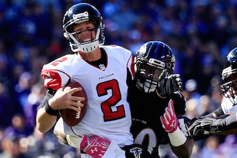 BALTIMORE, MD - OCTOBER 19:  Quarterback Matt Ryan #2 of the Atlanta Falcons is sacked in the second quarter by linebacker Pernell McPhee #90 of the Baltimore Ravens at M&T Bank Stadium on October 19, 2014 in Baltimore, Maryland.  (Photo by Rob Carr/Getty