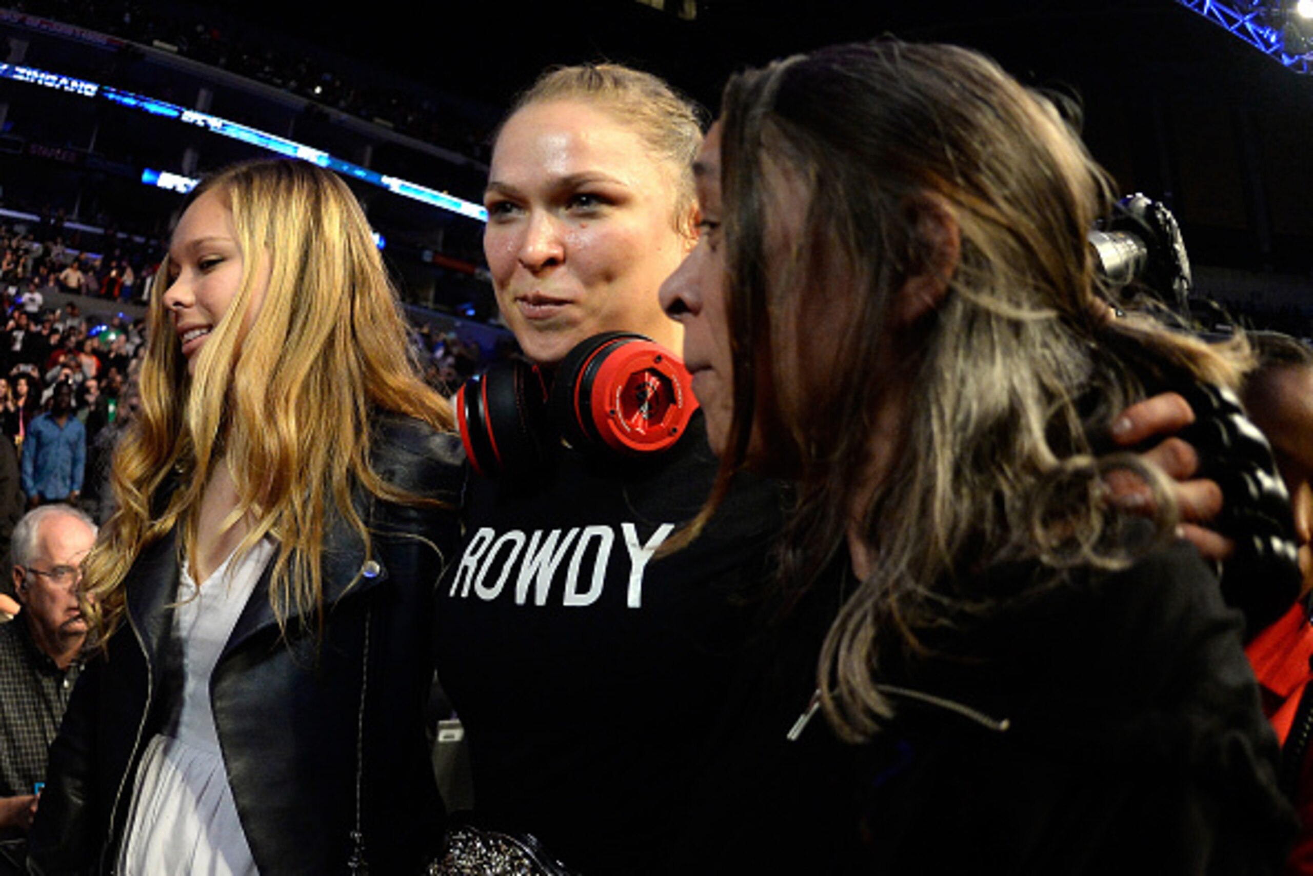LOS ANGELES, CA - FEBRUARY 28:  Ronda Rousey celebrates her victory over Cat Zingano in their UFC women's bantamweight championship bout during the UFC 184 event at Staples Center on February 28, 2015 in Los Angeles, California.  (Photo by Harry How/Getty