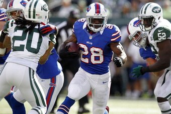 EAST RUTHERFORD, NJ - SEPTEMBER 09:   C.J. Spiller #28 of the Buffalo Bills runs against the New York Jets during their season opener at MetLife Stadium on September 9, 2012 in East Rutherford, New Jersey.  (Photo by Jeff Zelevansky/Getty Images)