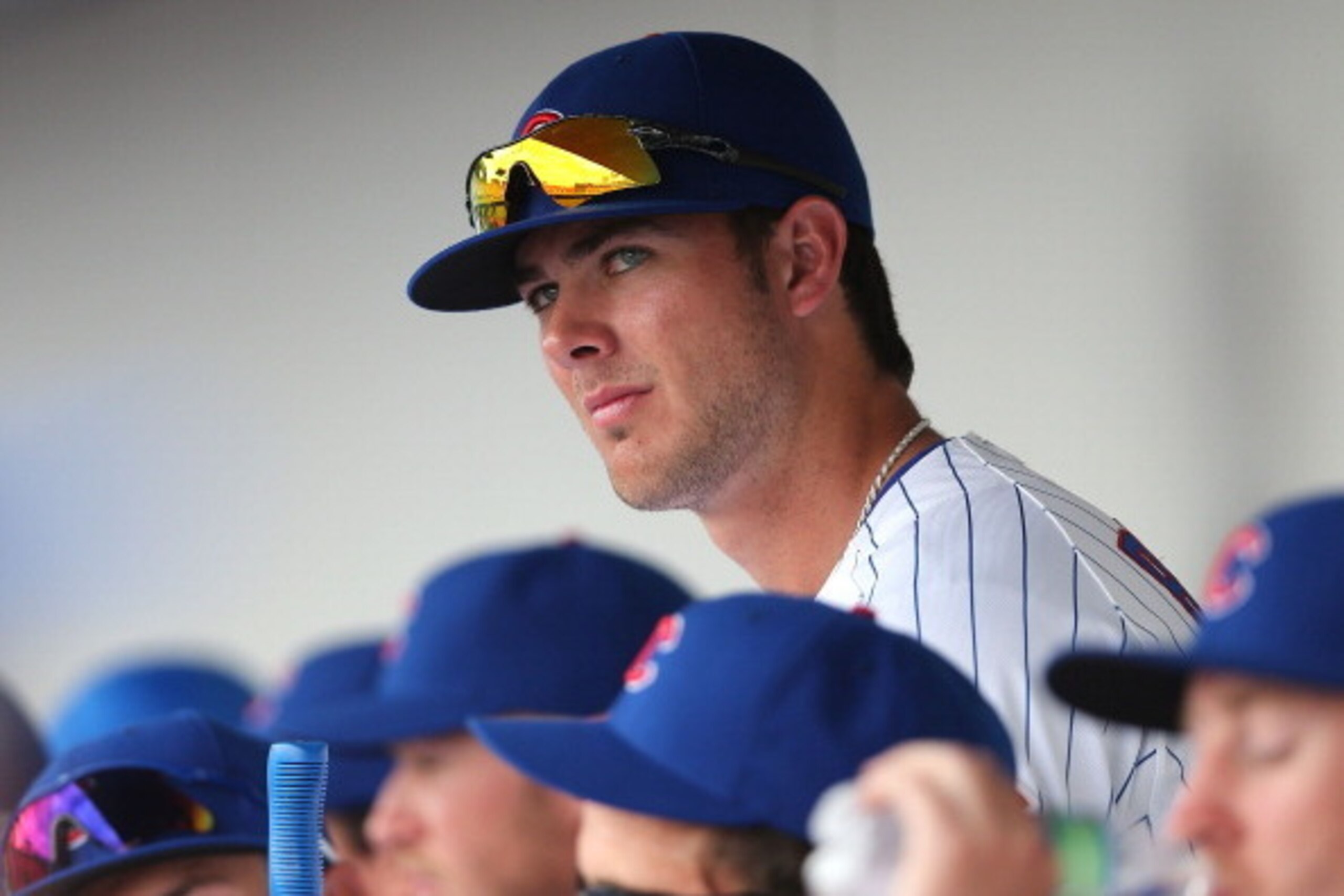 MESA, AZ - FEBRUARY 27:  Kris Bryant #77 of the Chicago Cubs watches from the dugout during the spring training game against the Arizona Diamondbacks at Cubs Park on February 27, 2014 in Mesa, Arizona  (Photo by Christian Petersen/Getty Images)