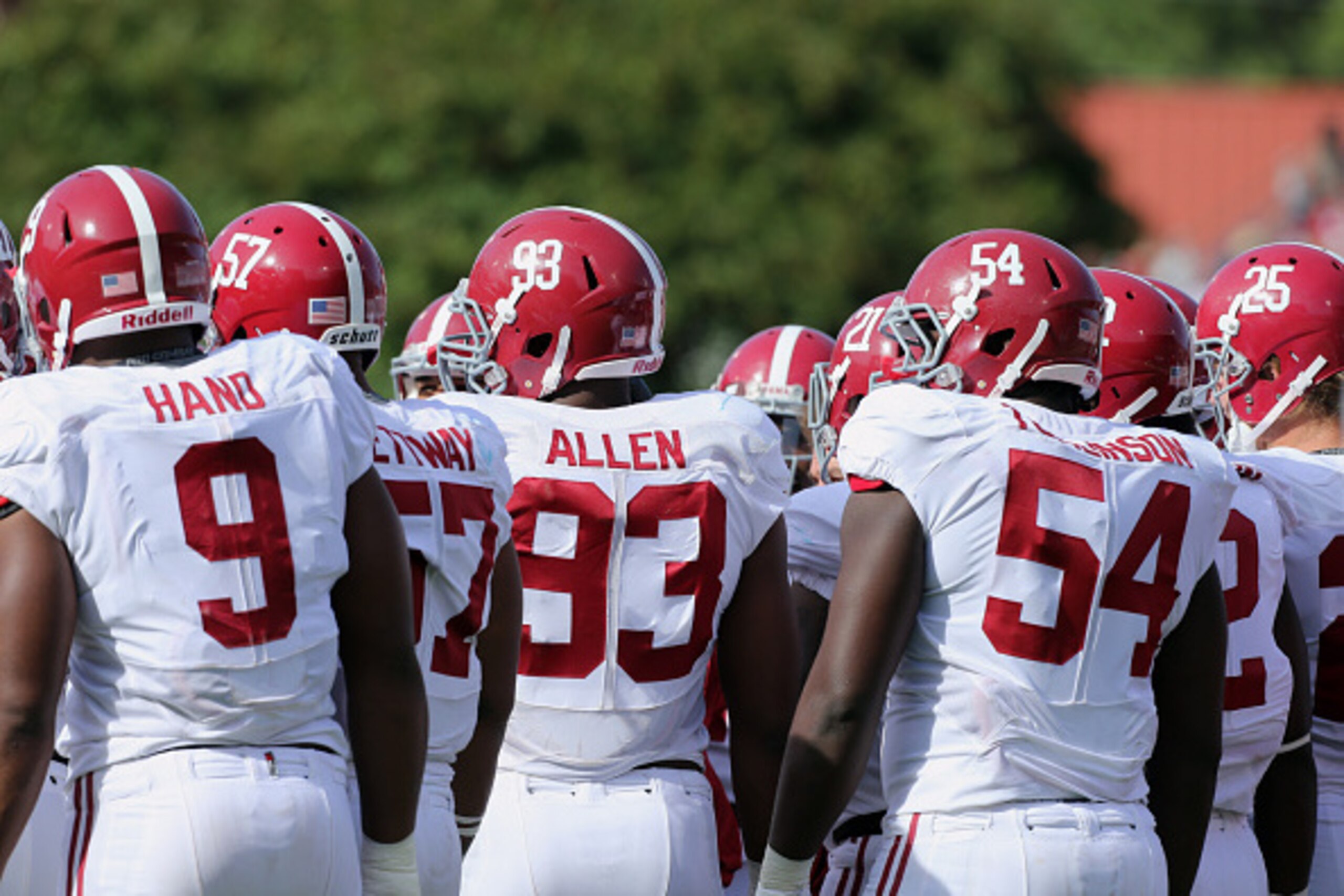 OXFORD, MS - OCTOBER 4: Da'Shawn Hand #9, Xzavier Dickson #47, Jonathan Allen #93 and Dalvin Tomlinson #54 of the Alabama Crimson Tide huddle with the defense against the Ole Miss Rebels on October 4, 2014 at Vaught-Hemingway Stadium in Oxford, Mississipp