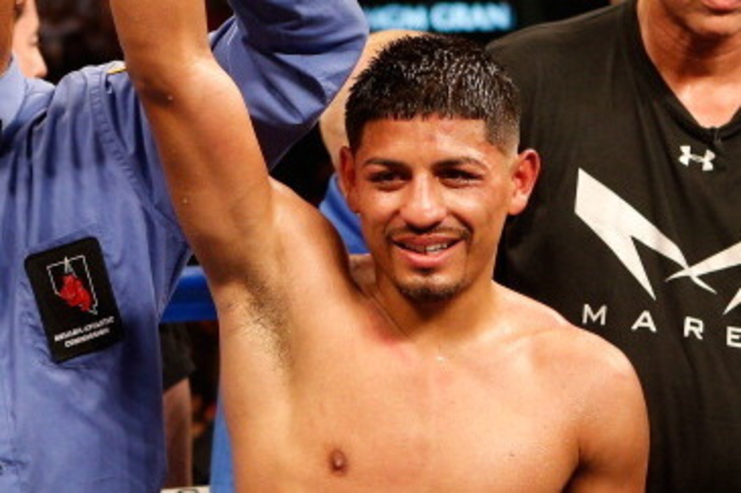 LAS VEGAS, NV - JULY 12:  Abner Mares celebrates after his unanimous decision victory during their featherweight bout at the MGM Grand Garden Arena on July 12, 2014 in Las Vegas, Nevada.  (Photo by Josh Hedges/Getty Images)
