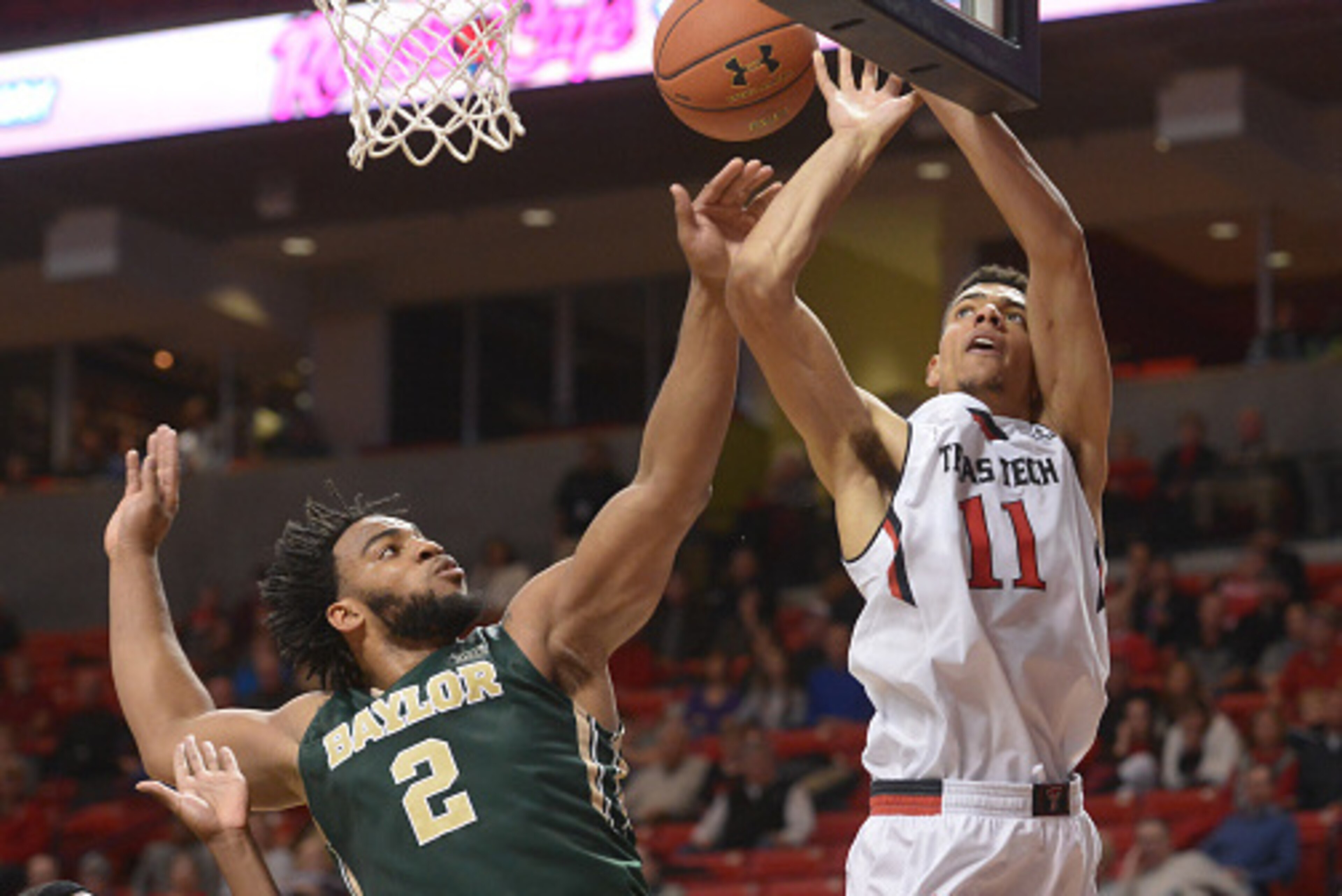 LUBBOCK, TX - FEBRUARY 17: Zach Smith #11 of the Texas Tech Red Raiders is fouled by Rico Gathers #2 of the Baylor Bears during the game on February 17, 2015 at United Supermarkets Arena in Lubbock, Texas. Baylor defeated Texas Tech 54-49. (Photo by John LUBBOCK, TX - FEBRUARY 17: Zach Smith #11 of the Texas Tech Red Raiders is fouled by Rico Gathers #2 of the Baylor Bears during the game on February 17, 2015 at United Supermarkets Arena in Lubbock, Texas. Baylor defeated Texas Tech 54-49. (Photo by John