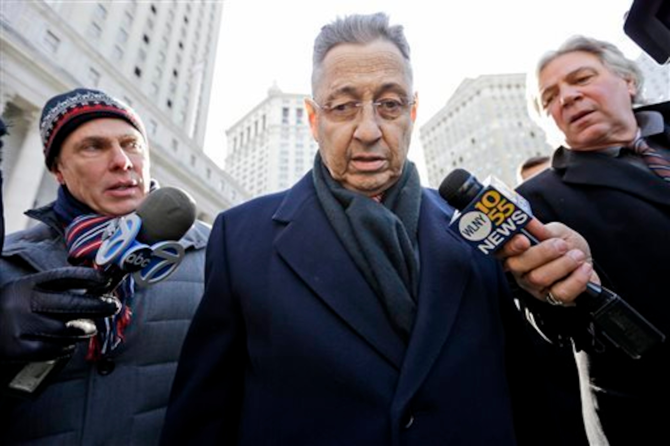 Former New York State Assembly Speaker Sheldon Silver (center).