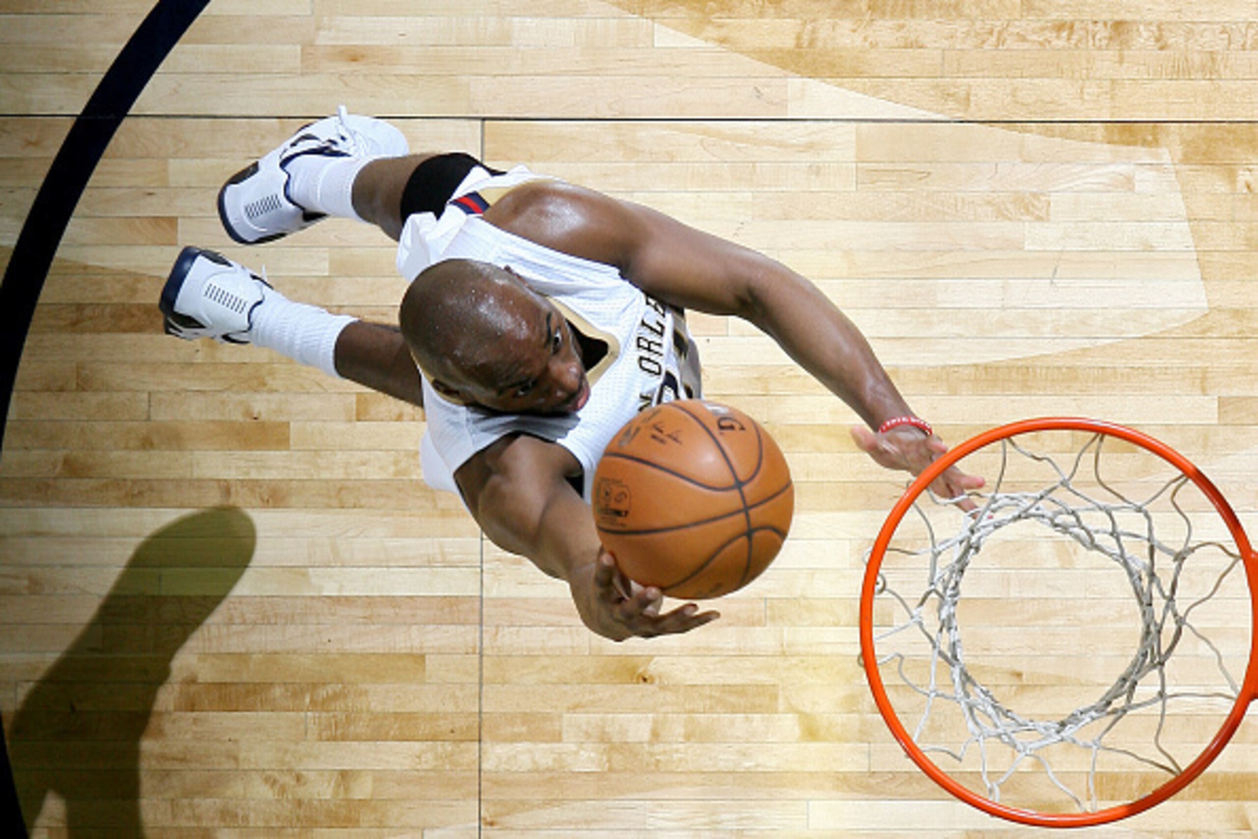 NEW ORLEANS, LA -  FEBRUARY 27:  Quincy Pondexter #20 of the New Orleans Pelicans goes up for a shot against the Miami Heat on February 27, 2015 at Smoothie King Center in New Orleans, Louisiana. NOTE TO USER: User expressly acknowledges and agrees that, 