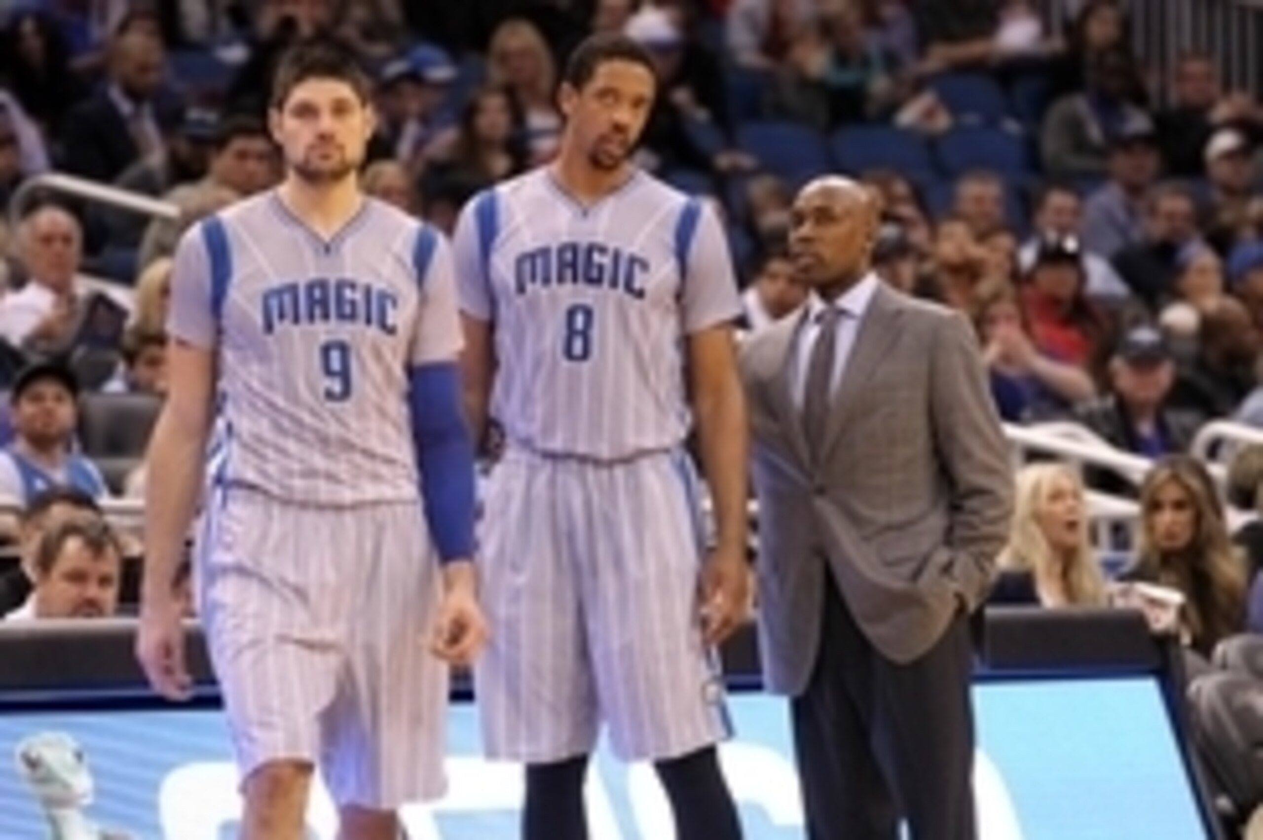 Jan 14, 2015; Orlando, FL, USA; Orlando Magic head coach Jacque Vaughn talks with forward Channing Frye (8) and center Nikola Vucevic (9) against the Houston Rockets during the second quarter at Amway Center. Mandatory Credit: Kim Klement-USA TODAY Sports Jan 14, 2015; Orlando, FL, USA; Orlando Magic head coach Jacque Vaughn talks with forward Channing Frye (8) and center Nikola Vucevic (9) against the Houston Rockets during the second quarter at Amway Center. Mandatory Credit: Kim Klement-USA TODAY Sports