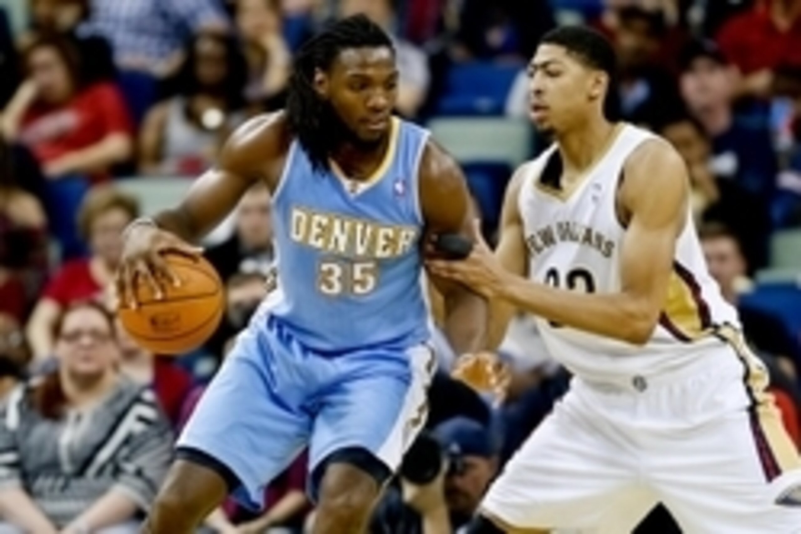 Mar 9, 2014; New Orleans, LA, USA; Denver Nuggets power forward Kenneth Faried (35) is defended by New Orleans Pelicans power forward Anthony Davis (23) during the second quarter of a game at the Smoothie King Center. Mandatory Credit: Derick E. Hingle-US Mar 9, 2014; New Orleans, LA, USA; Denver Nuggets power forward Kenneth Faried (35) is defended by New Orleans Pelicans power forward Anthony Davis (23) during the second quarter of a game at the Smoothie King Center. Mandatory Credit: Derick E. Hingle-US