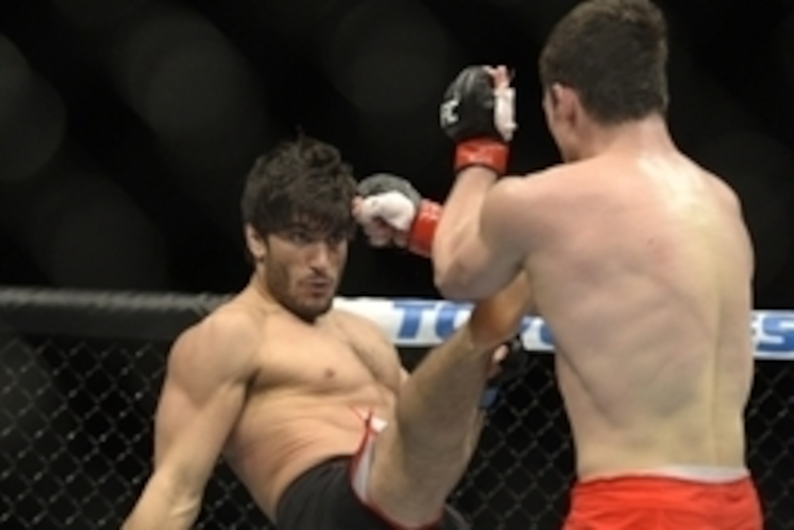 Apr 16, 2014; Quebec City, Quebec, Canada; Sheldon Westcott (red gloves) fights against Elias Theodorou (blue gloves) during their middleweight bout at Colisee Pepsi. Mandatory Credit: Eric Bolte-USA TODAY Sports
