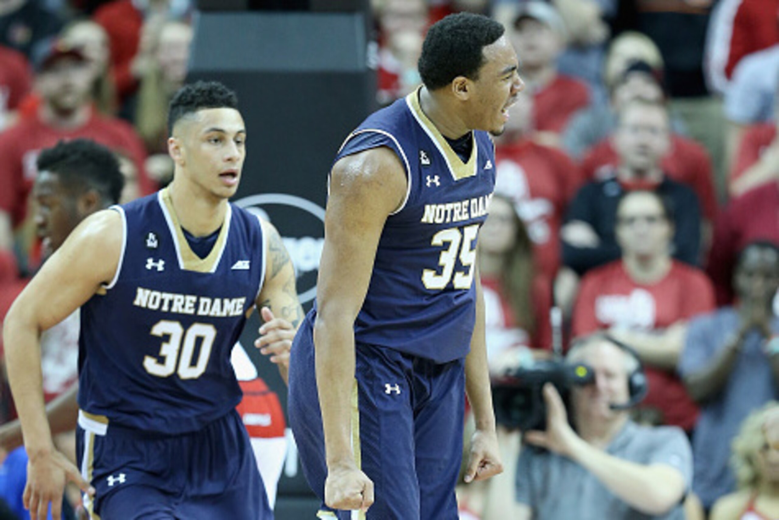 LOUISVILLE, KY - MARCH 04:  Bonzie Colson #35 of the Notre Dame Fighting Irish celebrates during the game against the Louisville Cardinals at KFC YUM! Center on March 4, 2015 in Louisville, Kentucky.  Notre Dame won 71-59.  (Photo by Andy Lyons/Getty Imag