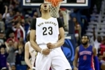 Mar 4, 2015; New Orleans, LA, USA; New Orleans Pelicans forward Anthony Davis (23) reacts after a basket by guard Tyreke Evans during the fourth quarter of a game against the Detroit Pistons at the Smoothie King Center. The Pelicans defeated the Pistons 8