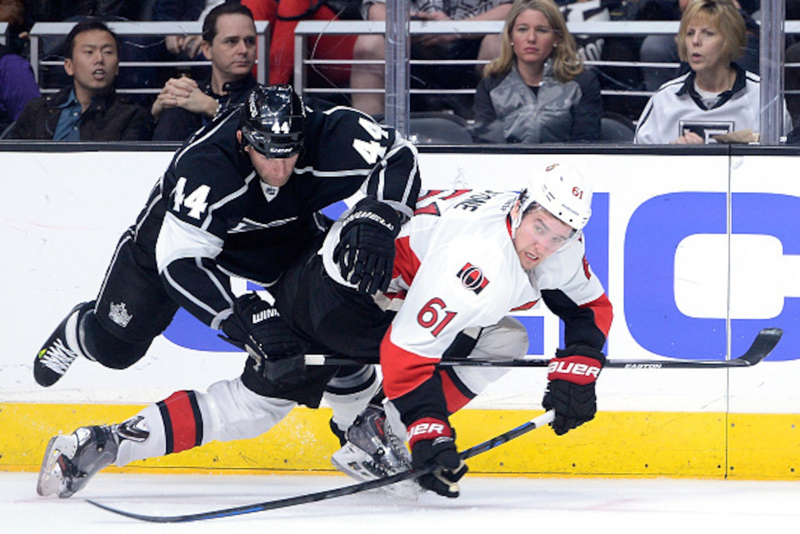 LOS ANGELES, CA - FEBRUARY 26:  Mark Stone #61 of the Ottawa Senators takes a check from Robyn Regehr #44 of the Los Angeles Kings during the second period at Staples Center on February 26, 2015 in Los Angeles, California.  (Photo by Harry How/Getty Image