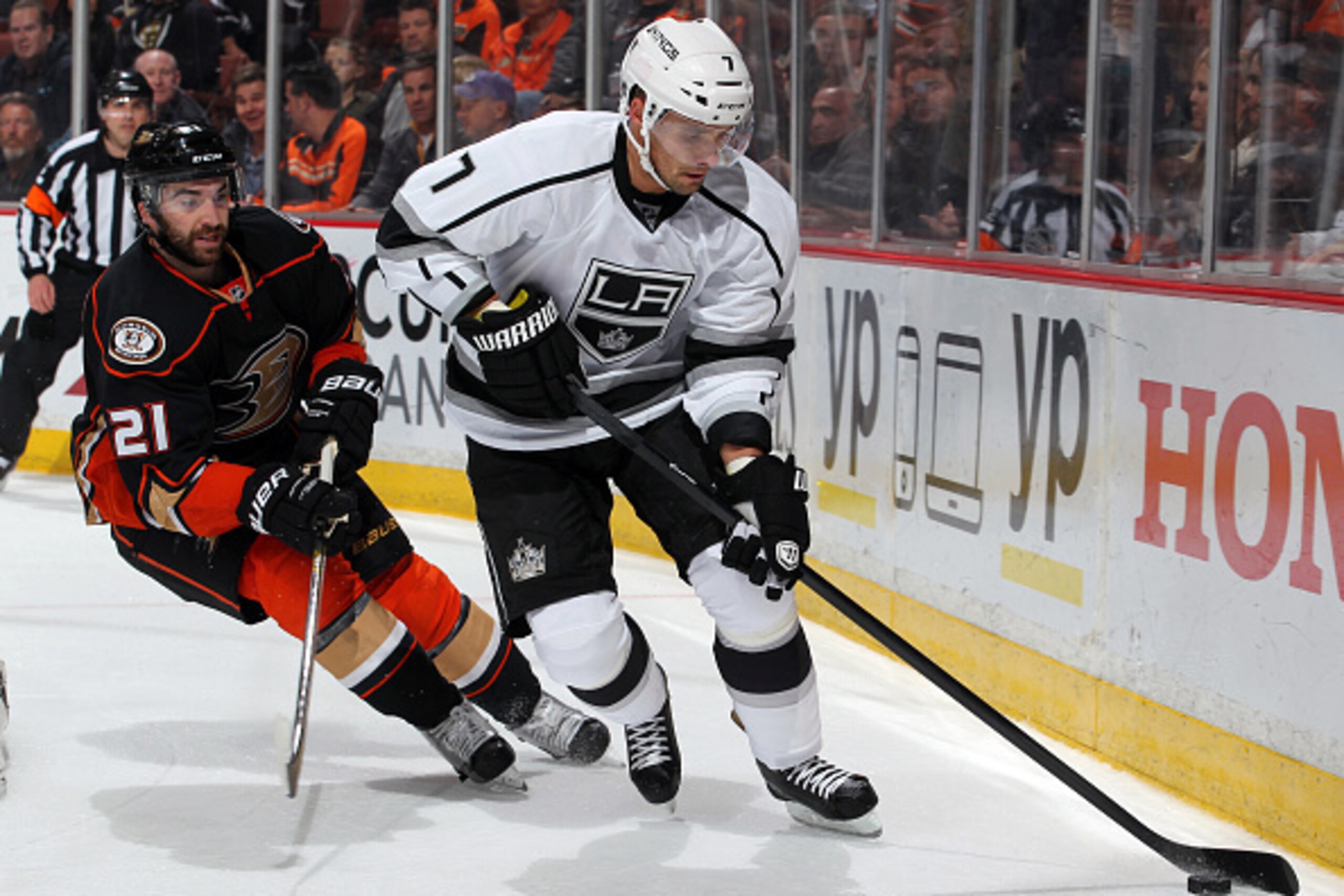 ANAHEIM, CA - FEBRUARY 27:  Andrej Sekera #7 of the Los Angeles Kings controls the puck with Kyle Palmieri #21 of the Anaheim Ducks trailing on February 27, 2015 at Honda Center in Anaheim, California. (Photo by Debora Robinson/NHLI via Getty Images)