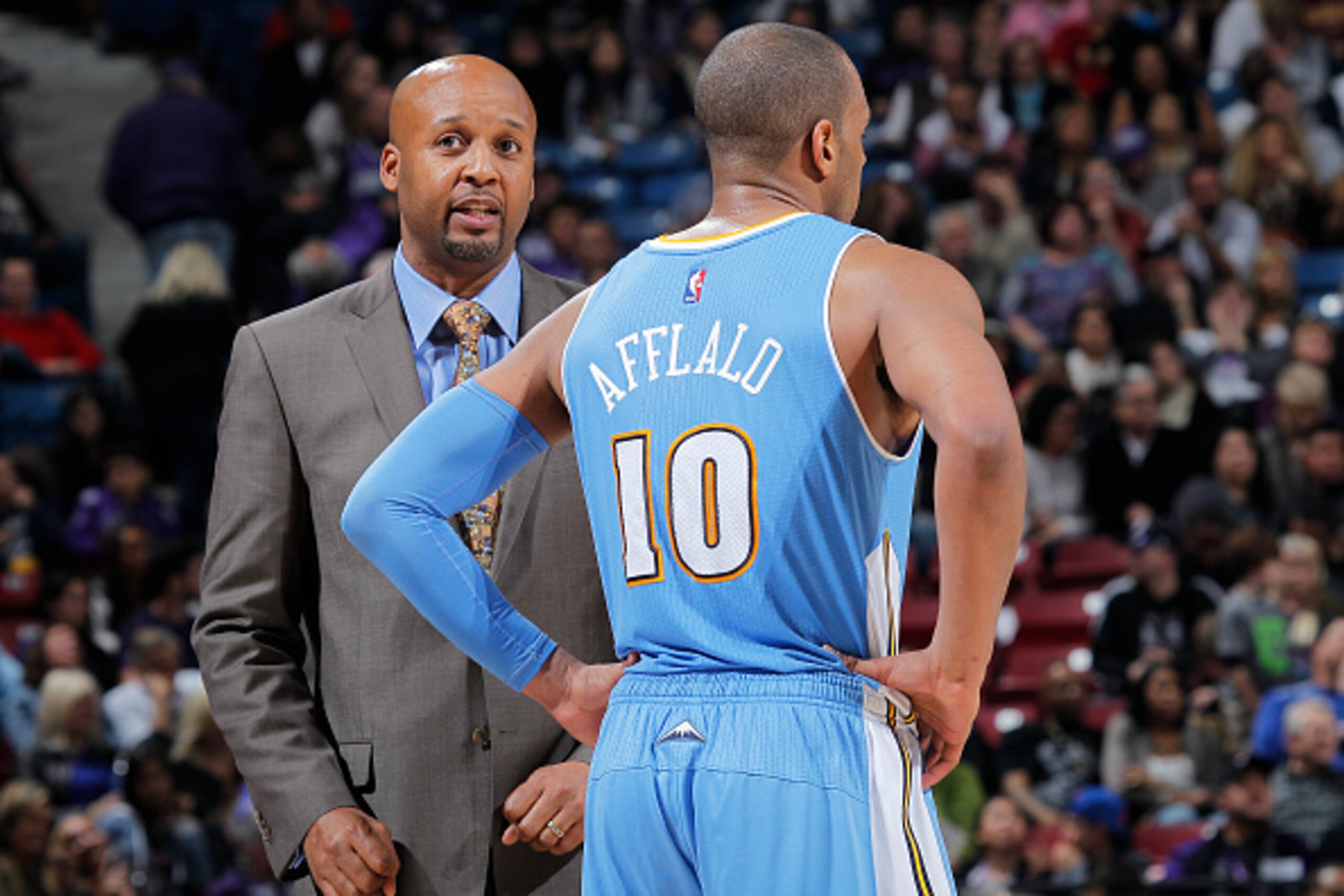 SACRAMENTO, CA - JANUARY 9: Head coach Brian Shaw of the Denver Nuggets coaches Arron Afflalo #10 against the Sacramento Kings on January 9, 2015 at Sleep Train Arena in Sacramento, California. NOTE TO USER: User expressly acknowledges and agrees that, by SACRAMENTO, CA - JANUARY 9: Head coach Brian Shaw of the Denver Nuggets coaches Arron Afflalo #10 against the Sacramento Kings on January 9, 2015 at Sleep Train Arena in Sacramento, California. NOTE TO USER: User expressly acknowledges and agrees that, by