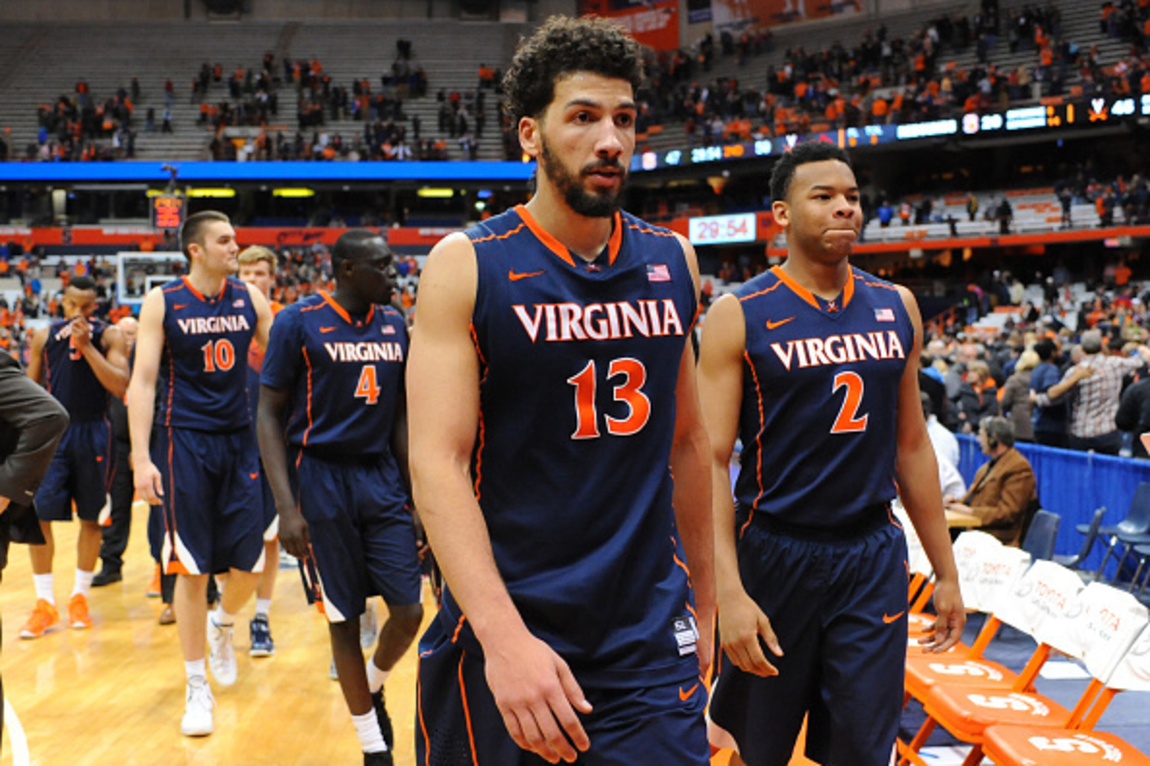 SYRACUSE, NY - MARCH 02: Anthony Gill #13 of the Virginia Cavaliers walks off the court following the game against the Syracuse Orange at the Carrier Dome on March 2, 2015 in Syracuse, New York. Virginia defeated Syracuse 59-47. (Photo by Rich Barnes/G SYRACUSE, NY - MARCH 02: Anthony Gill #13 of the Virginia Cavaliers walks off the court following the game against the Syracuse Orange at the Carrier Dome on March 2, 2015 in Syracuse, New York. Virginia defeated Syracuse 59-47. (Photo by Rich Barnes/G