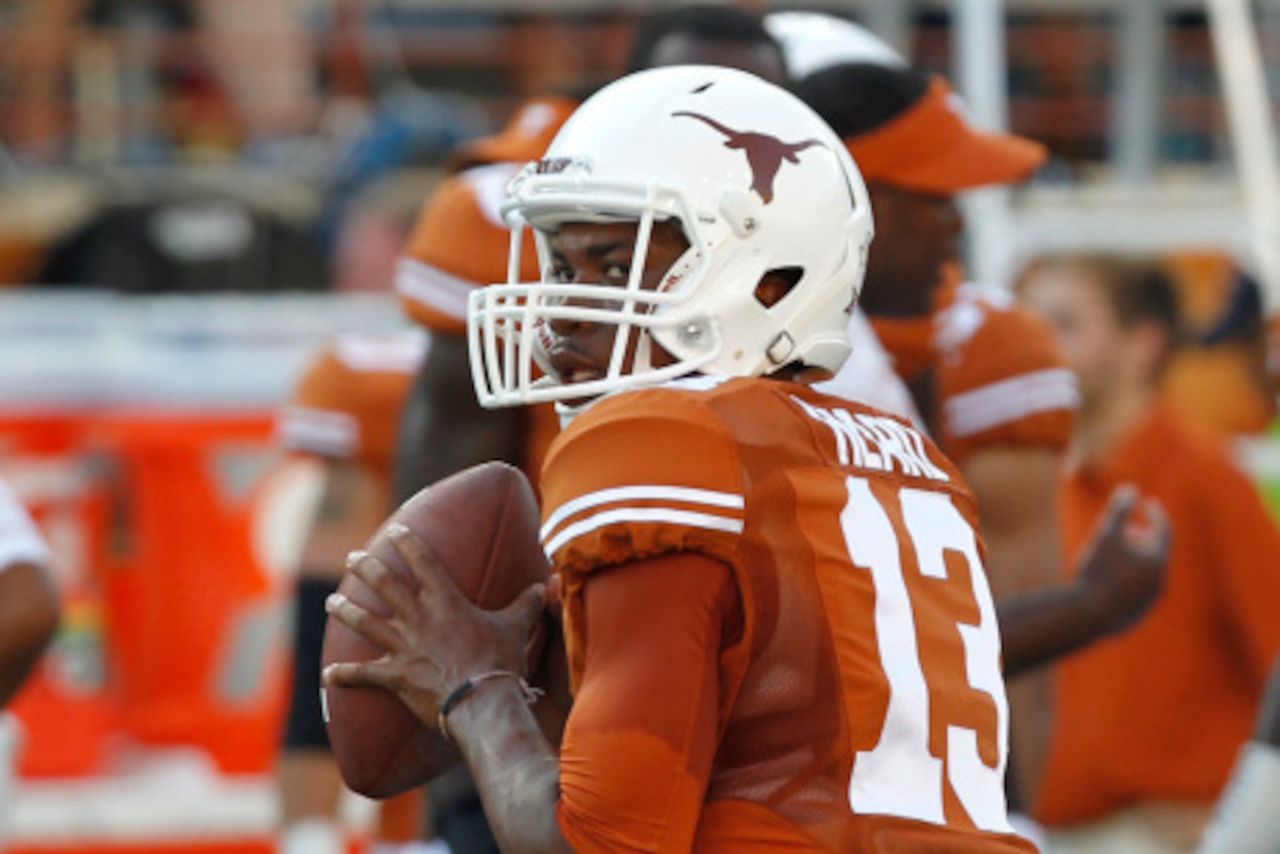 AUSTIN, TX - SEPTEMBER 6: Jerrod Heard #13 of the Texas Longhorns passes during pre game warmups before playing the BYU Cougars on September 6, 2014 at Darrell K Royal-Texas Memorial Stadium in Austin, Texas. (Photo by Chris Covatta/Getty Images)