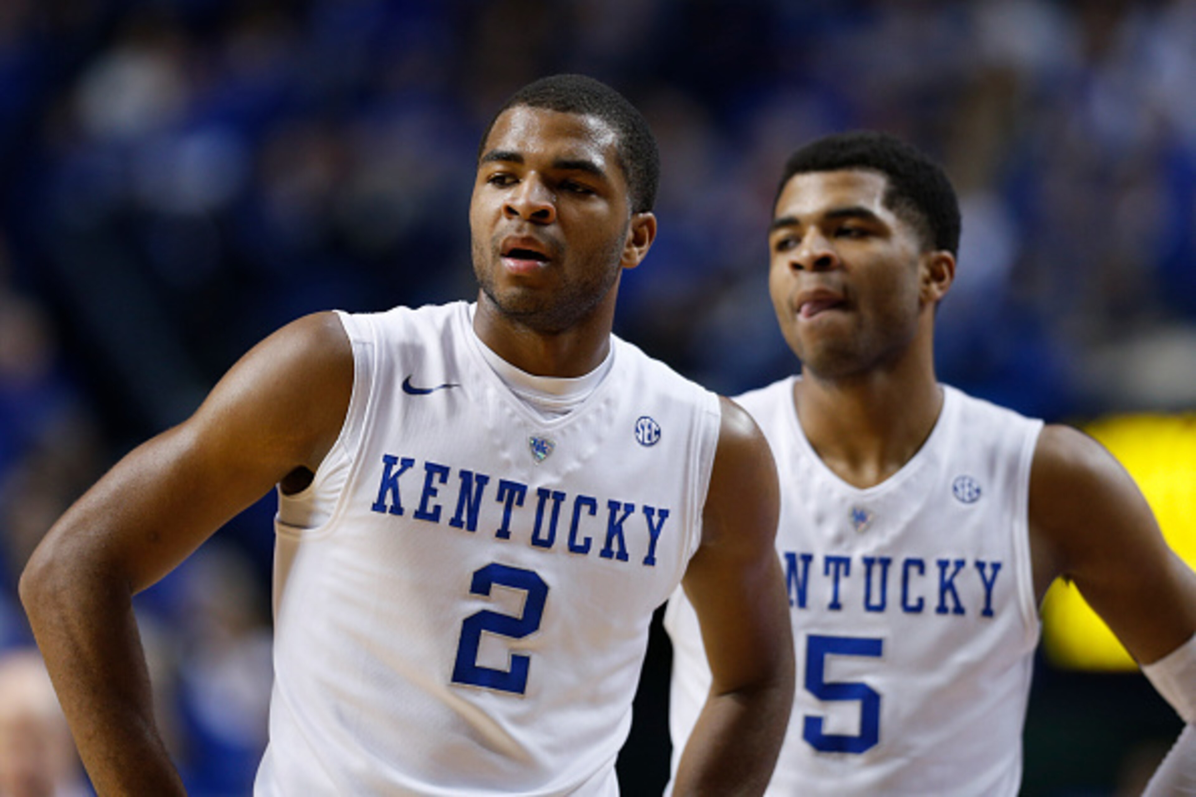LEXINGTON, KY - JANUARY 20: Aaron Harrison #2 and Andrew Harrison #5 of the Kentucky Wildcats look on against the Vanderbilt Commodores during the game at Rupp Arena on January 20, 2015 in Lexington, Kentucky. Kentucky defeated Vanderbilt 65-57. (Photo by