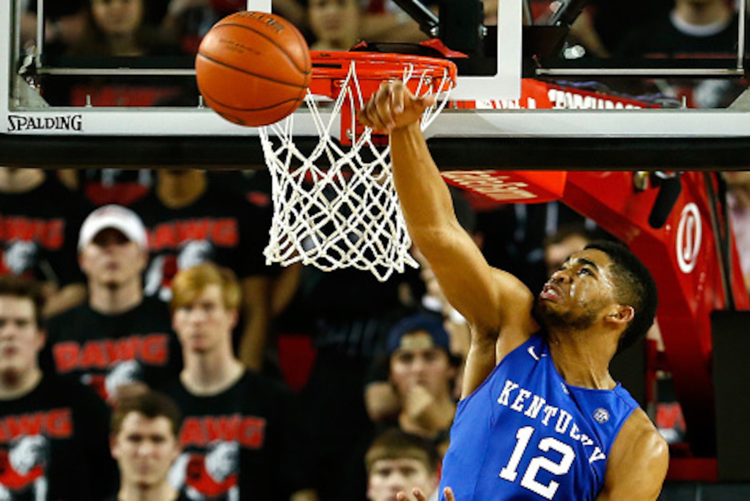 ATHENS, GA - MARCH 03:  Karl-Anthony Towns #12 of the Kentucky Wildcats blocks a shot by Charles Mann #4 of the Georgia Bulldogs at Stegeman Coliseum on March 3, 2015 in Athens, Georgia.  (Photo by Kevin C. Cox/Getty Images)