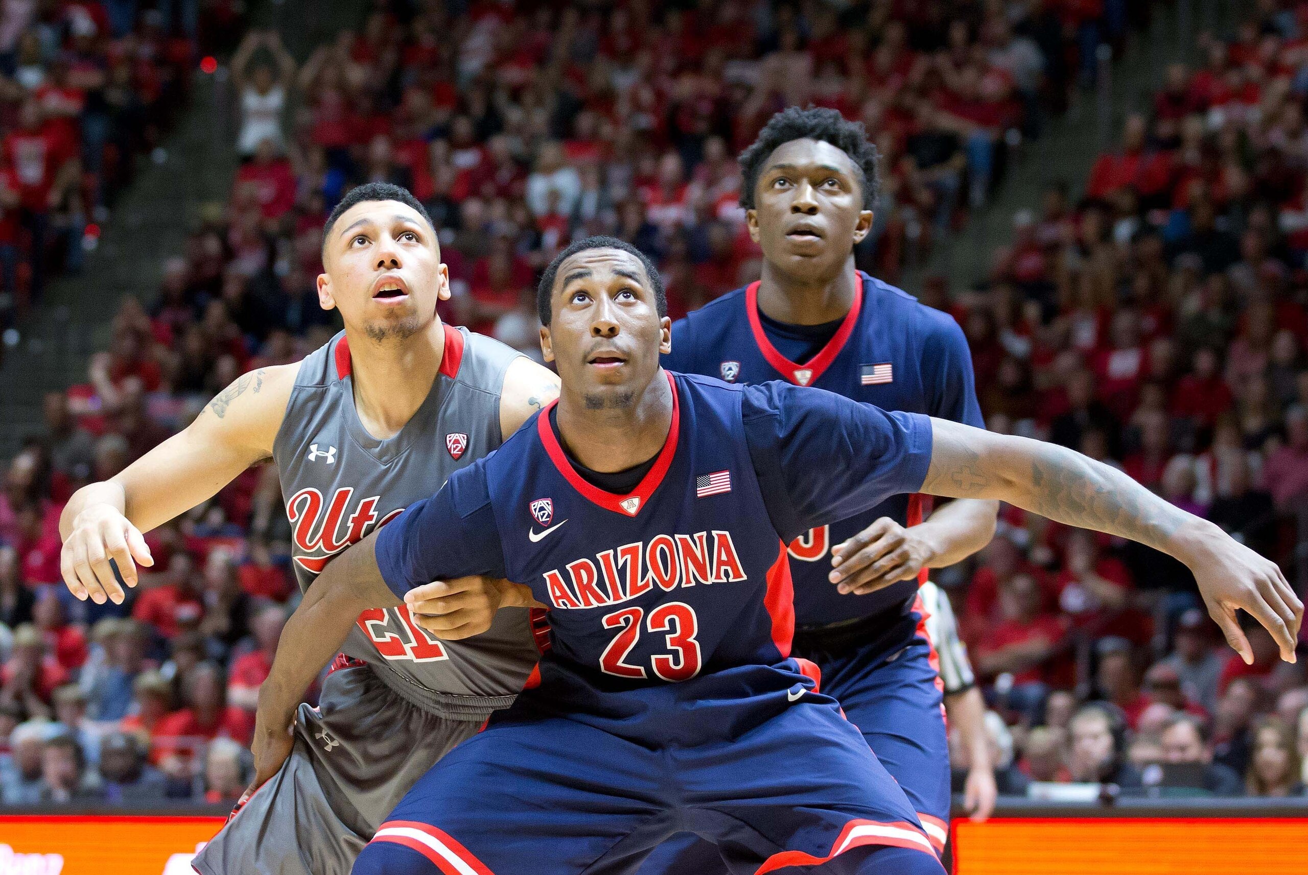 Feb 28, 2015; Salt Lake City, UT, USA; Arizona Wildcats forward Rondae Hollis-Jefferson (23) and forward Stanley Johnson (5) box out Utah Utes forward Jordan Loveridge (21) during the second half at Jon M. Huntsman Center. Arizona won 63-57. Mandatory Cre Feb 28, 2015; Salt Lake City, UT, USA; Arizona Wildcats forward Rondae Hollis-Jefferson (23) and forward Stanley Johnson (5) box out Utah Utes forward Jordan Loveridge (21) during the second half at Jon M. Huntsman Center. Arizona won 63-57. Mandatory Cre