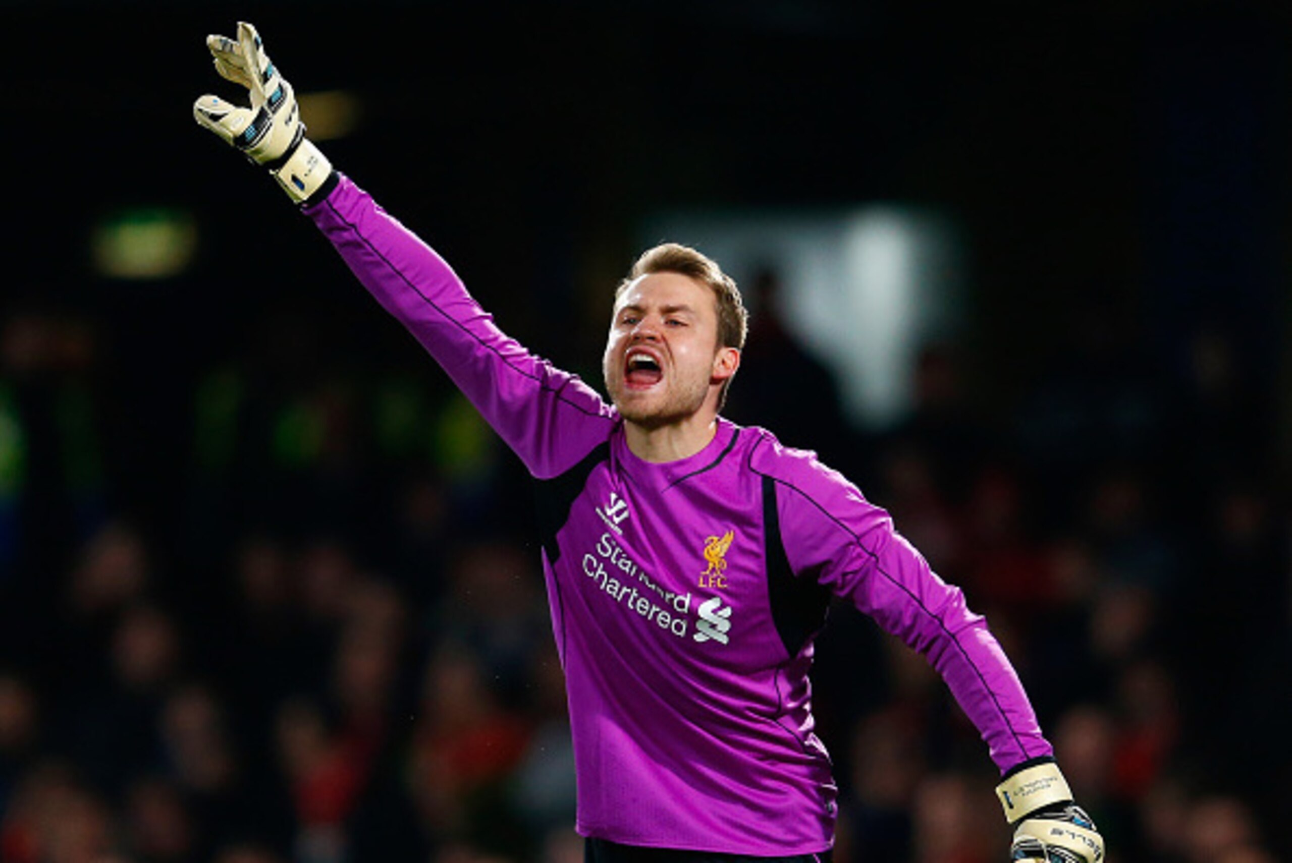 LONDON, ENGLAND - JANUARY 27:  Simon Mignolet of Liverpool shouts instructions during the Capital One Cup Semi-Final second leg between Chelsea and Liverpool at Stamford Bridge on January 27, 2015 in London, England.  (Photo by Julian Finney/Getty Images)