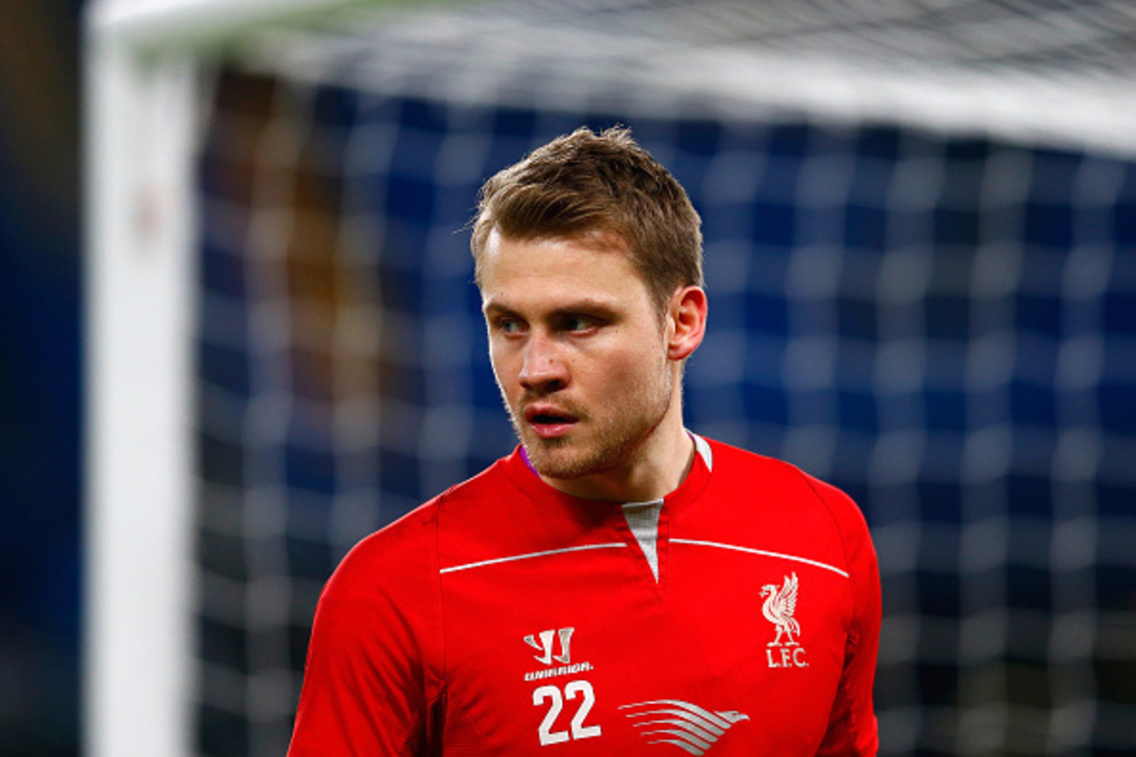 LONDON, ENGLAND - JANUARY 27:  Simon Mignolet of Liverpool warms up ahead of the Capital One Cup Semi-Final second leg between Chelsea and Liverpool at Stamford Bridge on January 27, 2015 in London, England.  (Photo by Julian Finney/Getty Images)