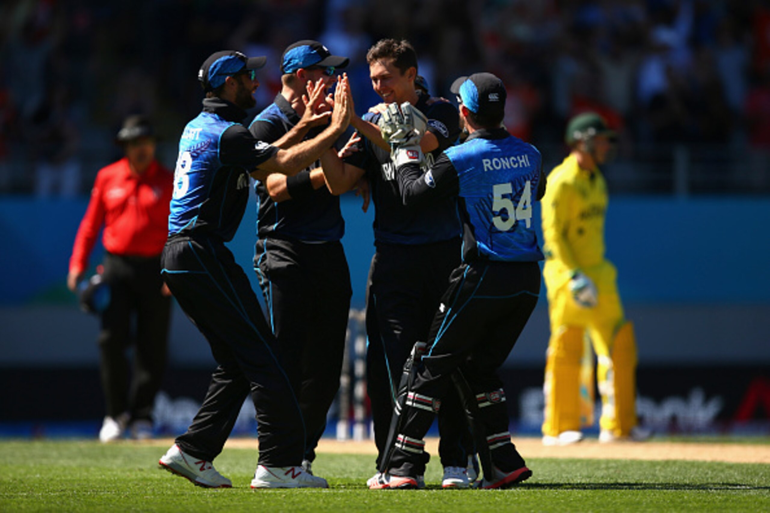 AUCKLAND, NEW ZEALAND - FEBRUARY 28:  Trent Boult of New Zealand celebrates after taking the wicket of Mitch Marsh of Australia  during the 2015 ICC Cricket World Cup match between Australia and New Zealand at Eden Park on February 28, 2015 in Auckland, N