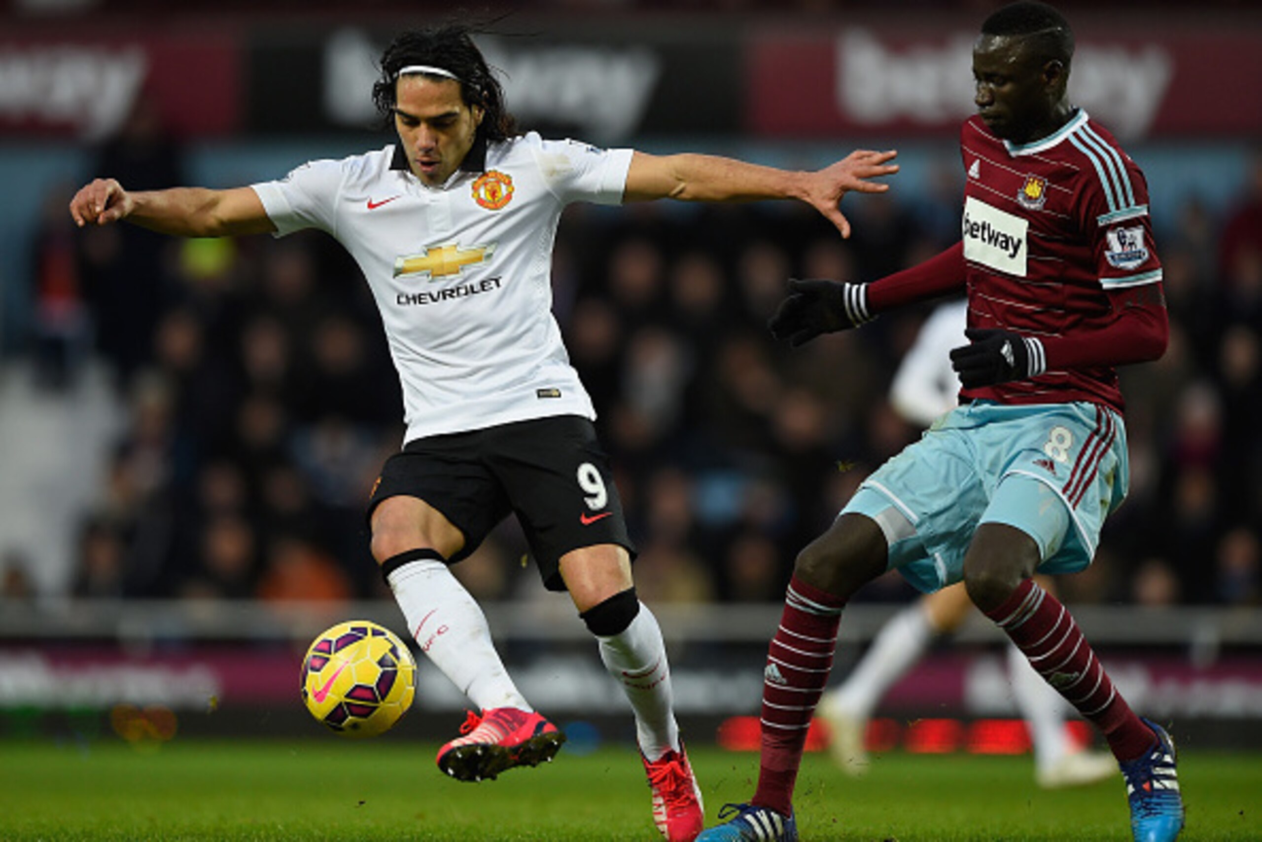 LONDON, ENGLAND - FEBRUARY 08:  Radamel Falcao of Manchester United is challenged by Cheikhou Kouyate of West Ham during the Barclays Premier League match between West Ham United and Manchester United at Boleyn Ground on February 8, 2015 in London, Englan