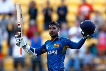 WELLINGTON, NEW ZEALAND - MARCH 01:  Kumar Sangakkara of Sri Lanka celebrates his century during the 2015 ICC Cricket World Cup match between England and Sri Lanka at Wellington Regional Stadium on March 1, 2015 in Wellington, New Zealand.  (Photo by Phil