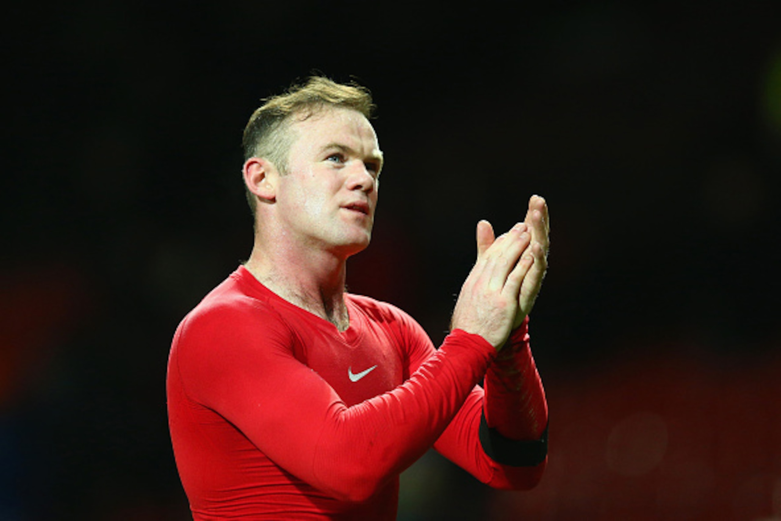 MANCHESTER, ENGLAND - FEBRUARY 03:  Wayne Rooney of Manchester United applauds the fans after victory in the FA Cup Fourth round replay match between Manchester United and Cambridge United at Old Trafford on February 3, 2015 in Manchester, England.  (Phot