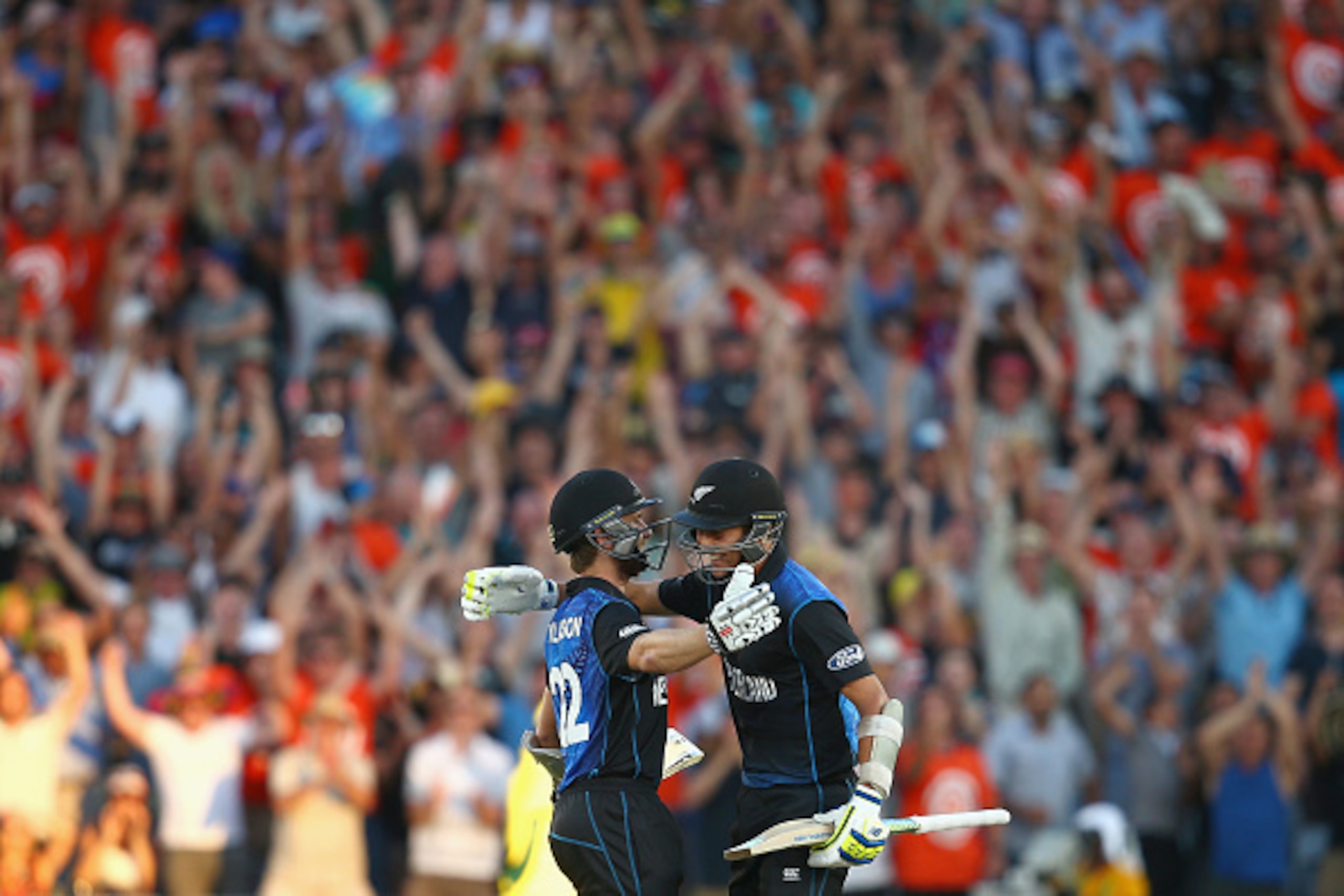 AUCKLAND, NEW ZEALAND - FEBRUARY 28:  Kane Williamson and Trent Boult of New Zealand celebrate victory during the 2015 ICC Cricket World Cup match between Australia and New Zealand at Eden Park on February 28, 2015 in Auckland, New Zealand.  (Photo by Mar