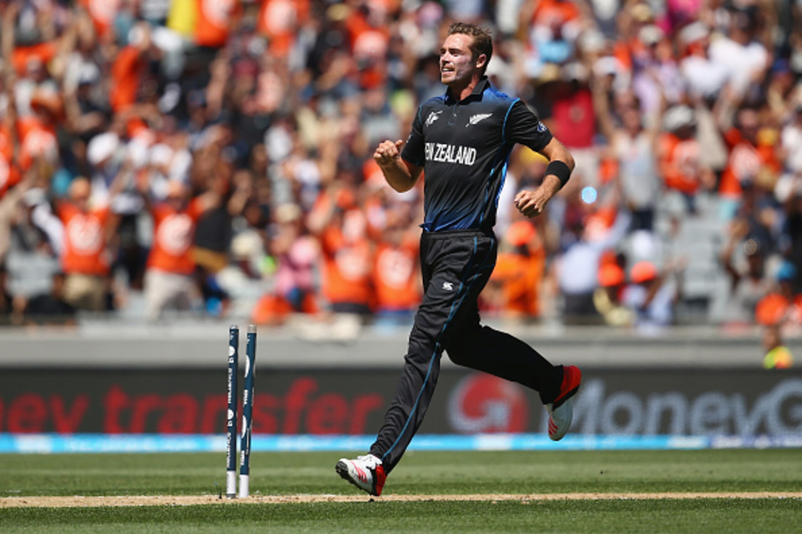 AUCKLAND, NEW ZEALAND - FEBRUARY 28:  Tim Southee of New Zealand celebrates taking the wicket of Aaron Finch of Australia during the 2015 ICC Cricket World Cup match between Australia and New Zealand at Eden Park on February 28, 2015 in Auckland, New Zeal