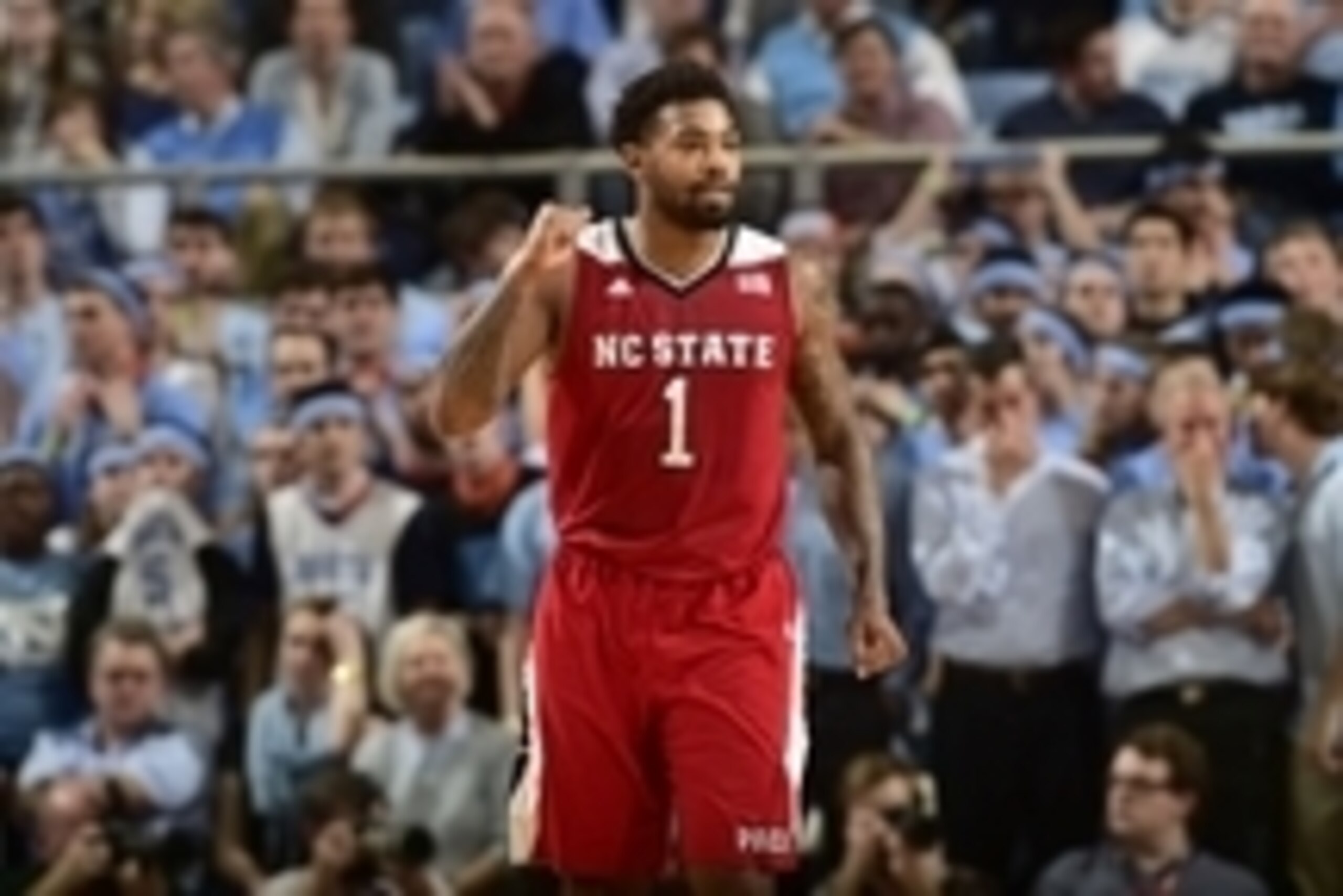 Feb 24, 2015; Chapel Hill, NC, USA; North Carolina State Wolfpack guard Trevor Lacey (1) reacts in the second half. The North Carolina State Wolfpack defeated the North Carolina Tar Heels 58-46 at Dean E. Smith Center. Mandatory Credit: Bob Donnan-USA TOD