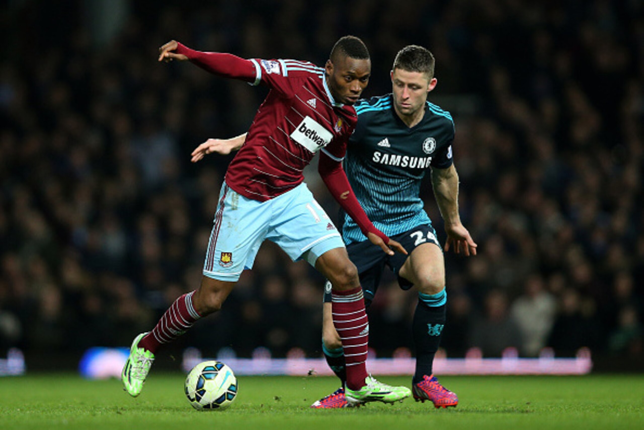 LONDON, ENGLAND - MARCH 04:  Diafra Sakho of West Ham is challenged by Gary Cahill of Chelsea during the Barclays Premier League match between West Ham and Chelsea at the Boleyn Ground on March 4, 2015 in London, England.  (Photo by Paul Gilham/Getty Imag
