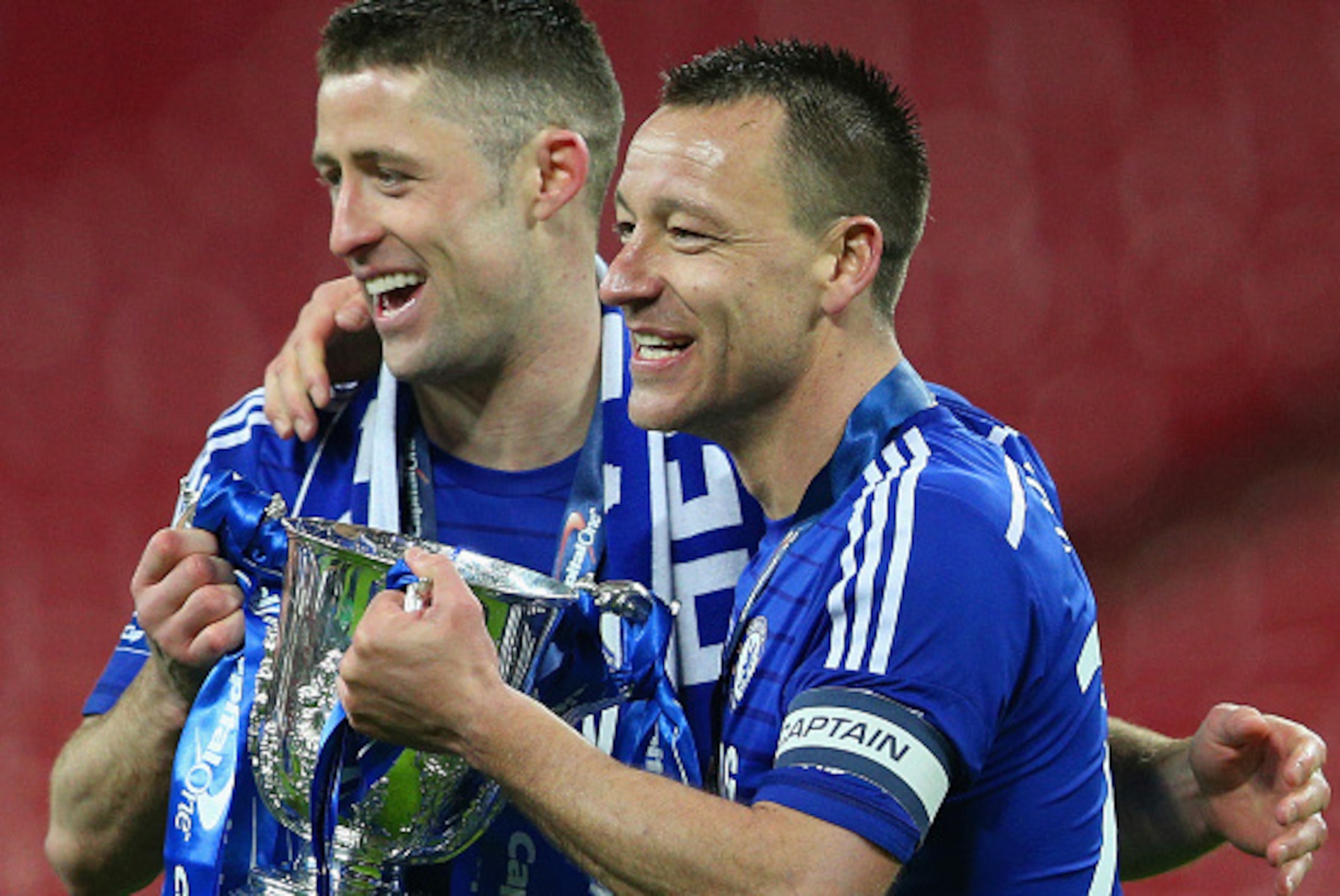 LONDON, ENGLAND - MARCH 01:  Captain John Terry  and Gary Cahill of Chelsea celebrates with the trophy during the Capital One Cup Final match between Chelsea and Tottenham Hotspur at Wembley Stadium on March 1, 2015 in London, England.  (Photo by Clive Ma