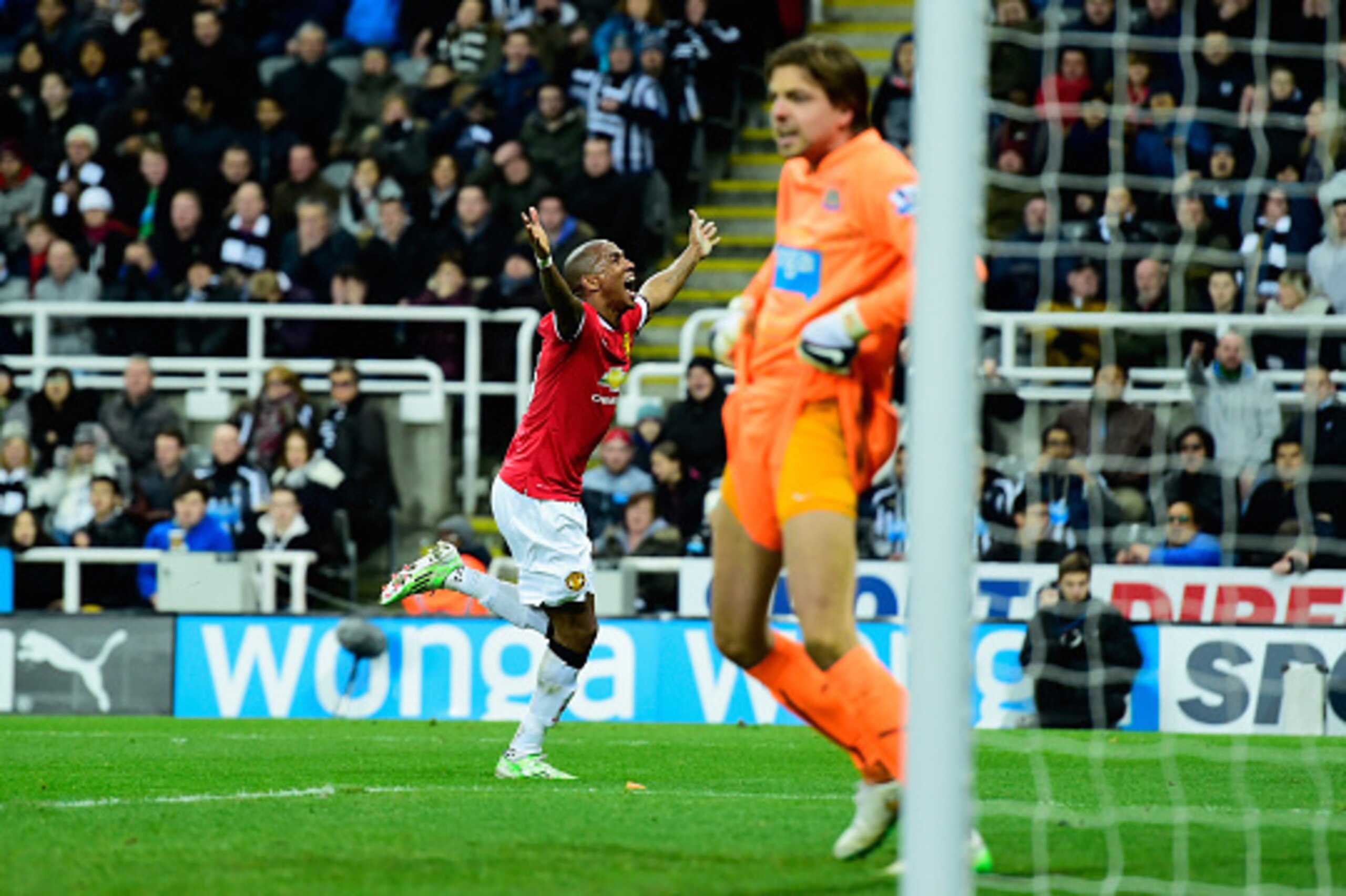 NEWCASTLE UPON TYNE, ENGLAND - MARCH 04:  Newcastle goalkeeper Tim Krul reacts as Ashley Young celebrates after scoring the opening goal during the Barclays Premier League match between Newcastle United and Manchester United at St James' Park on March 4, 
