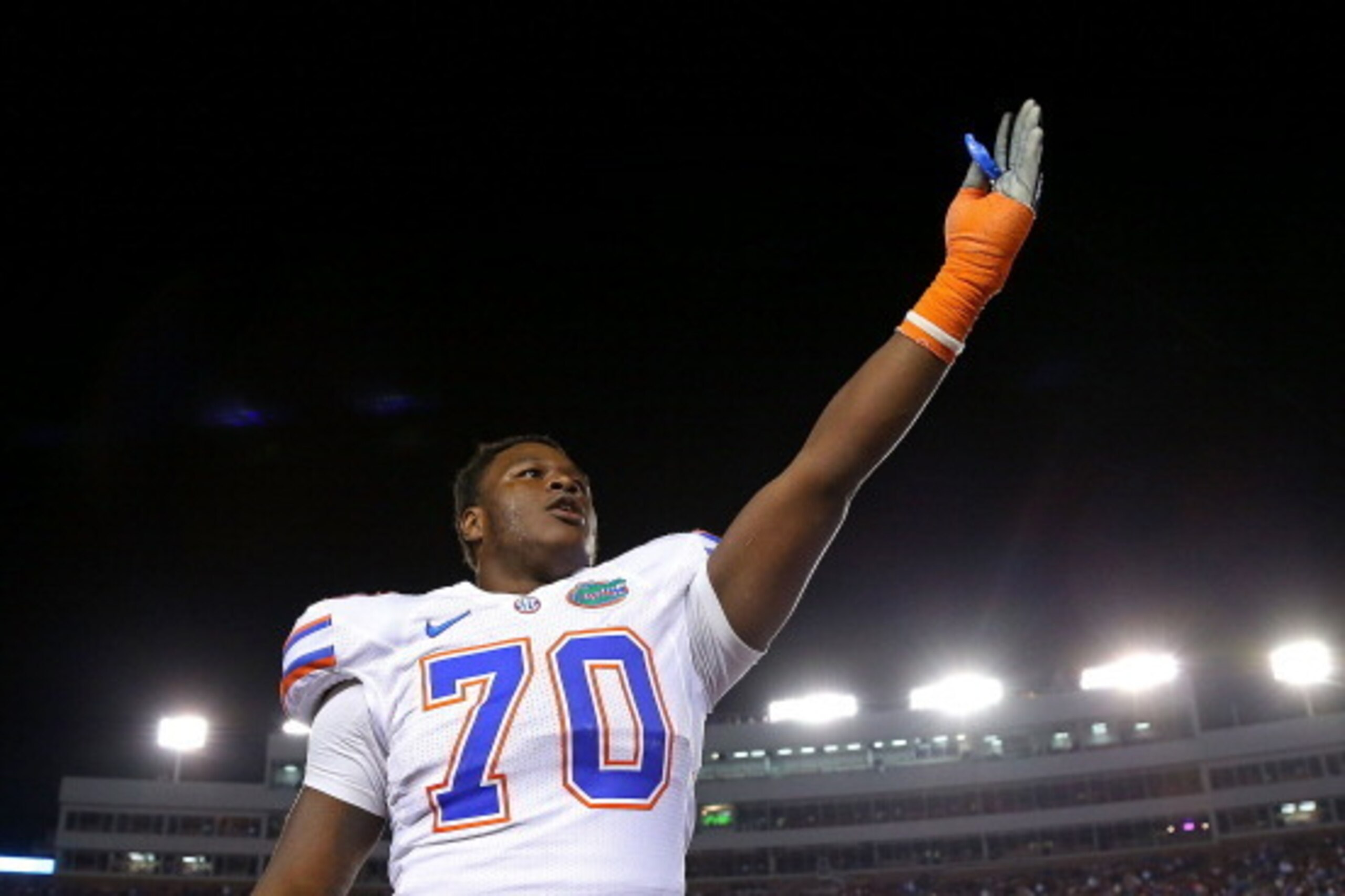 TALLAHASSEE, FL - NOVEMBER 24:  D.J. Humphries #70 of the Florida Gators waves to the crowd during a game against the Florida State Seminoles at Doak Campbell Stadium on November 24, 2012 in Tallahassee, Florida.  (Photo by Mike Ehrmann/Getty Images)