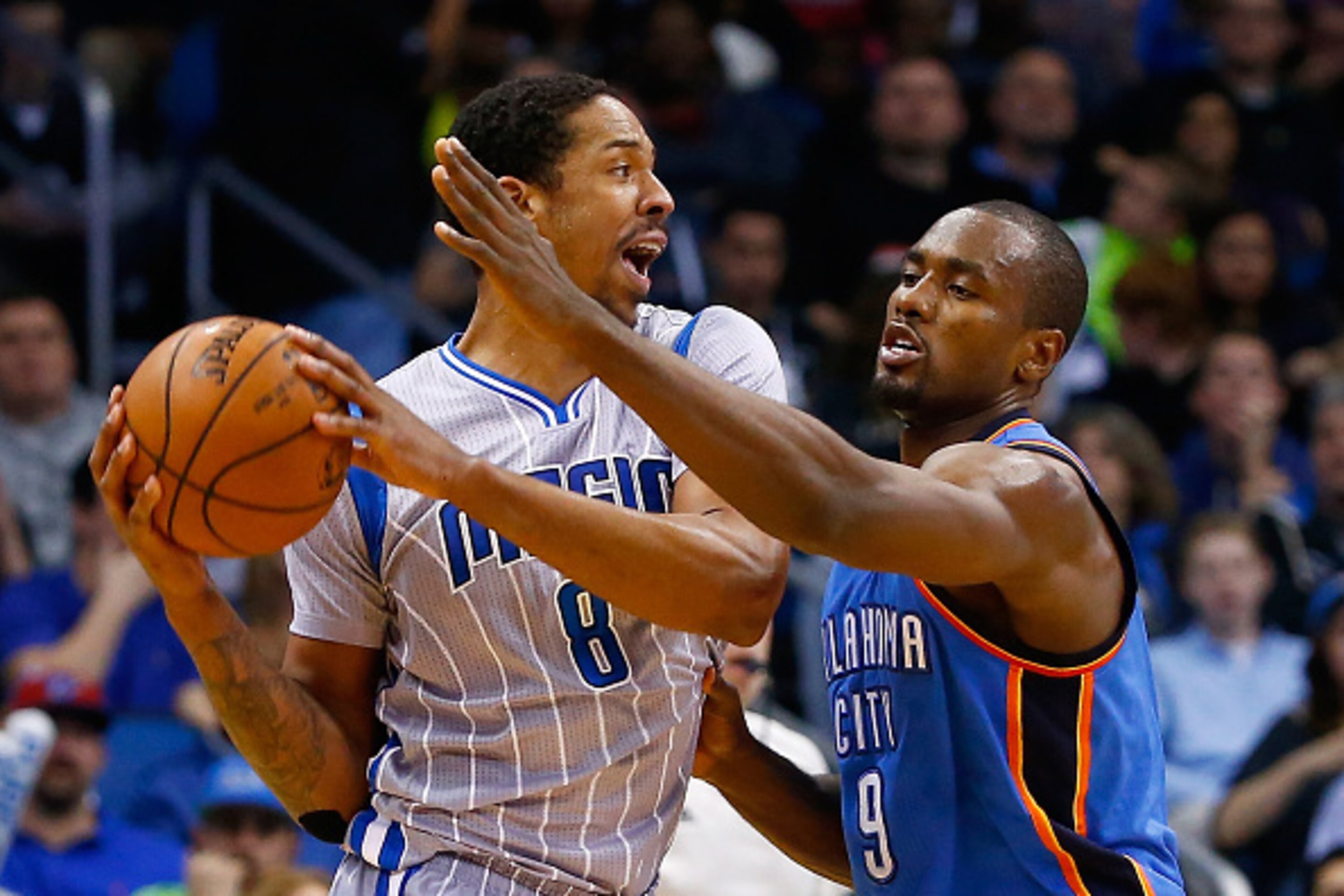 ORLANDO, FL - JANUARY 18:  Channing Frye #8 of the Orlando Magic is gaurded by Serge Ibaka #9 of the Oklahoma City Thunder during the game at Amway Center on January 18, 2015 in Orlando, Florida. NOTE TO USER: User expressly acknowledges and agrees that, 