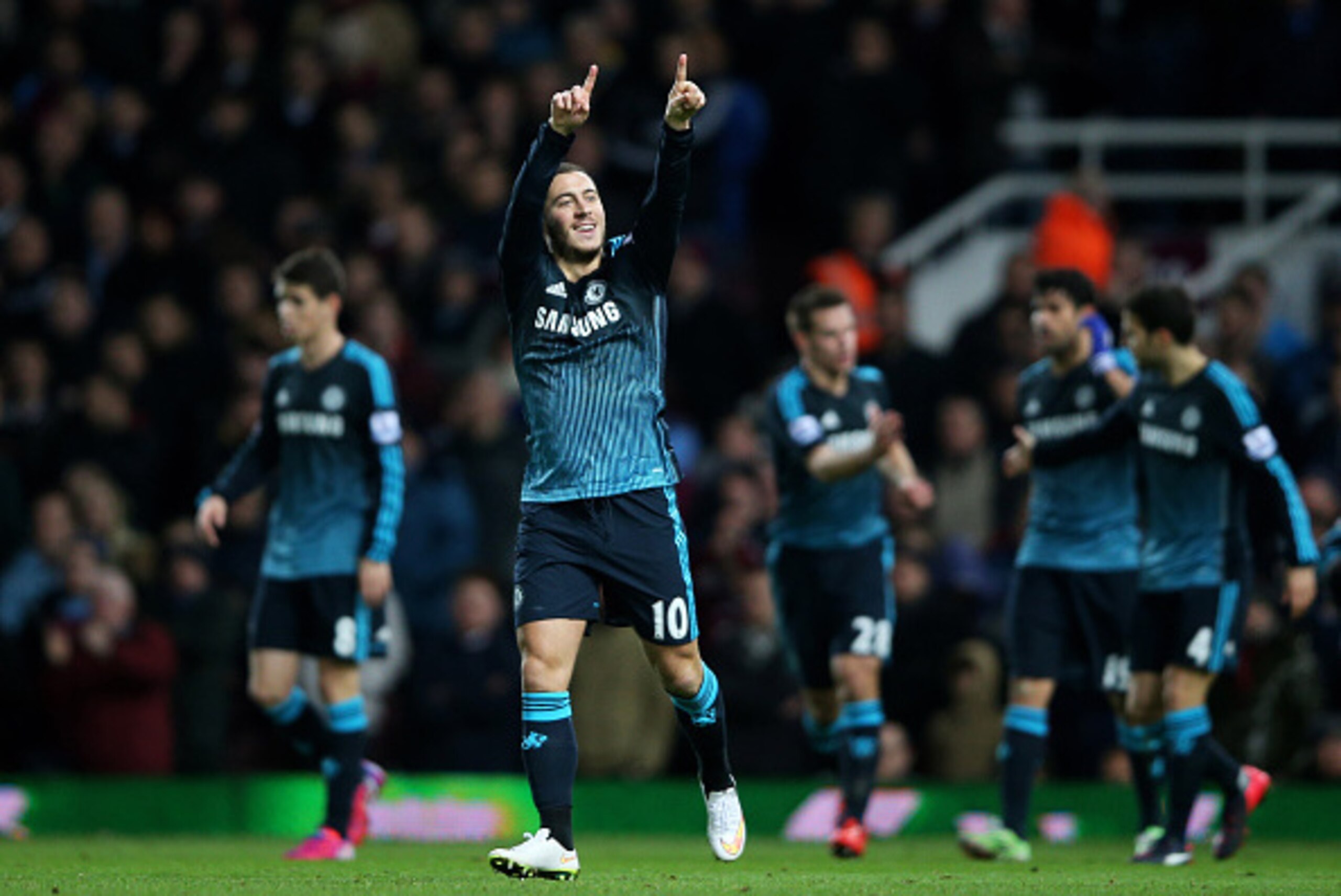 LONDON, ENGLAND - MARCH 04:  Eden Hazard of Chelsea celebrates after scoring the opening goal during the Barclays Premier League match between West Ham and Chelsea at the Boleyn Ground on March 4, 2015 in London, England.  (Photo by Paul Gilham/Getty Imag